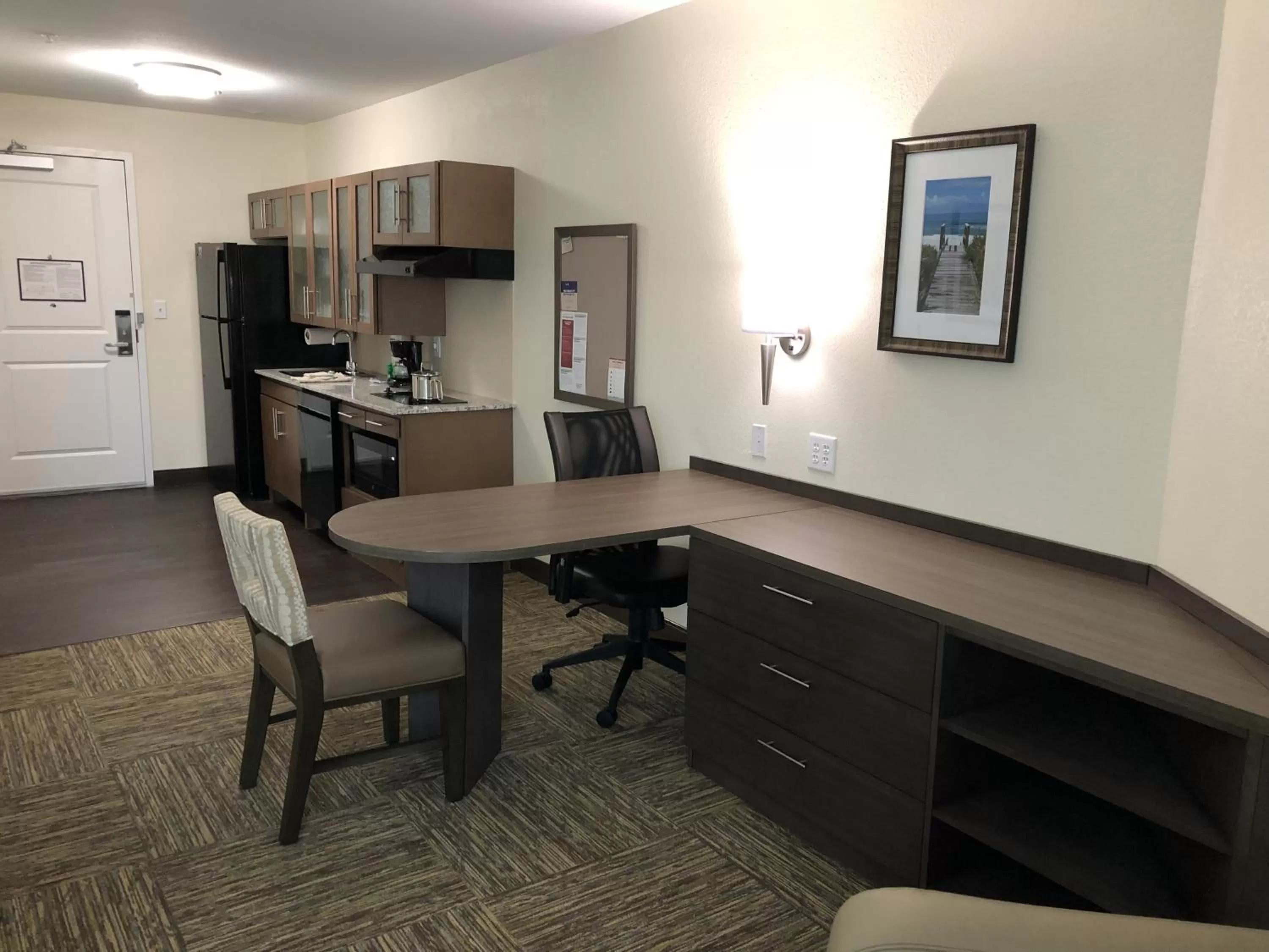 Living room in Candlewood Suites - Panama City Beach Pier Park by IHG