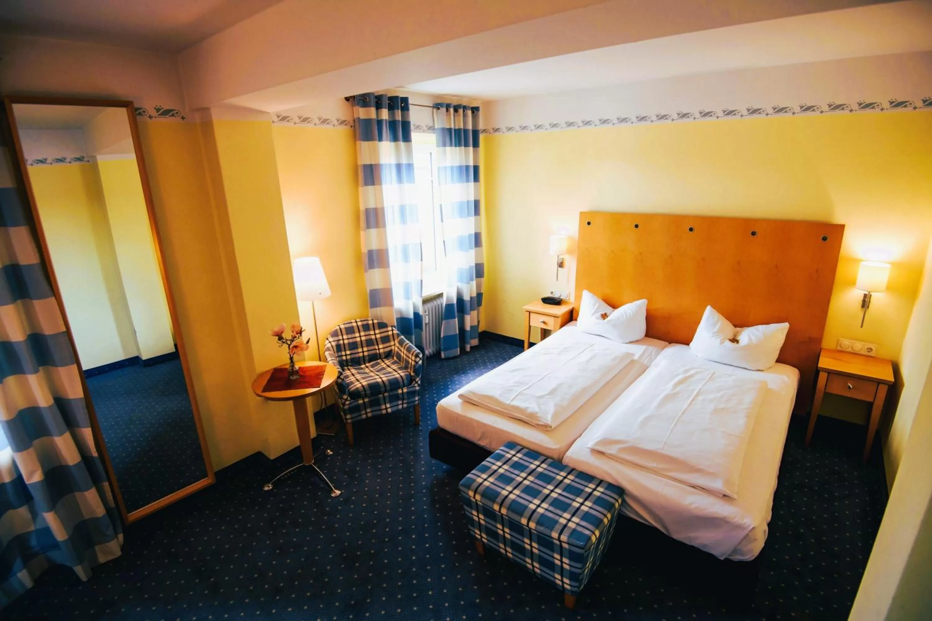 Bed in Hotel Rosenheimer Hof