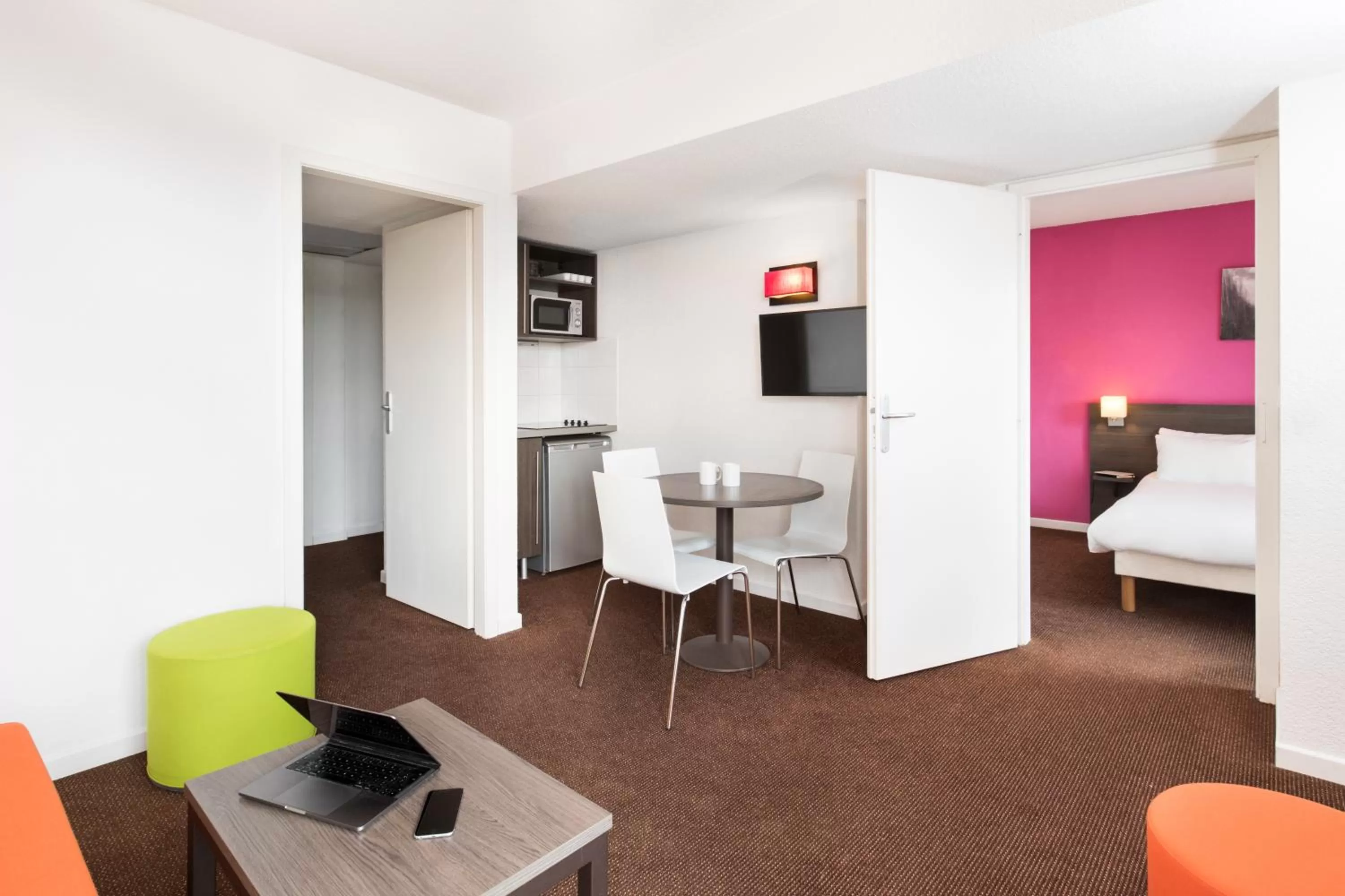 Living room, Bed in Aparthotel Adagio Access Strasbourg Petite France