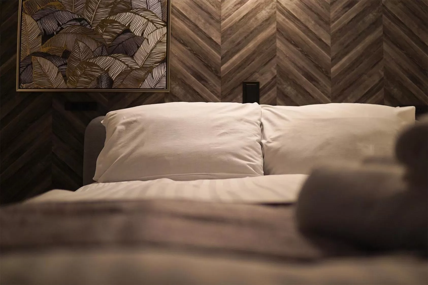 Bed in TAKETO STAY PREMIERE SAPPORO Eki