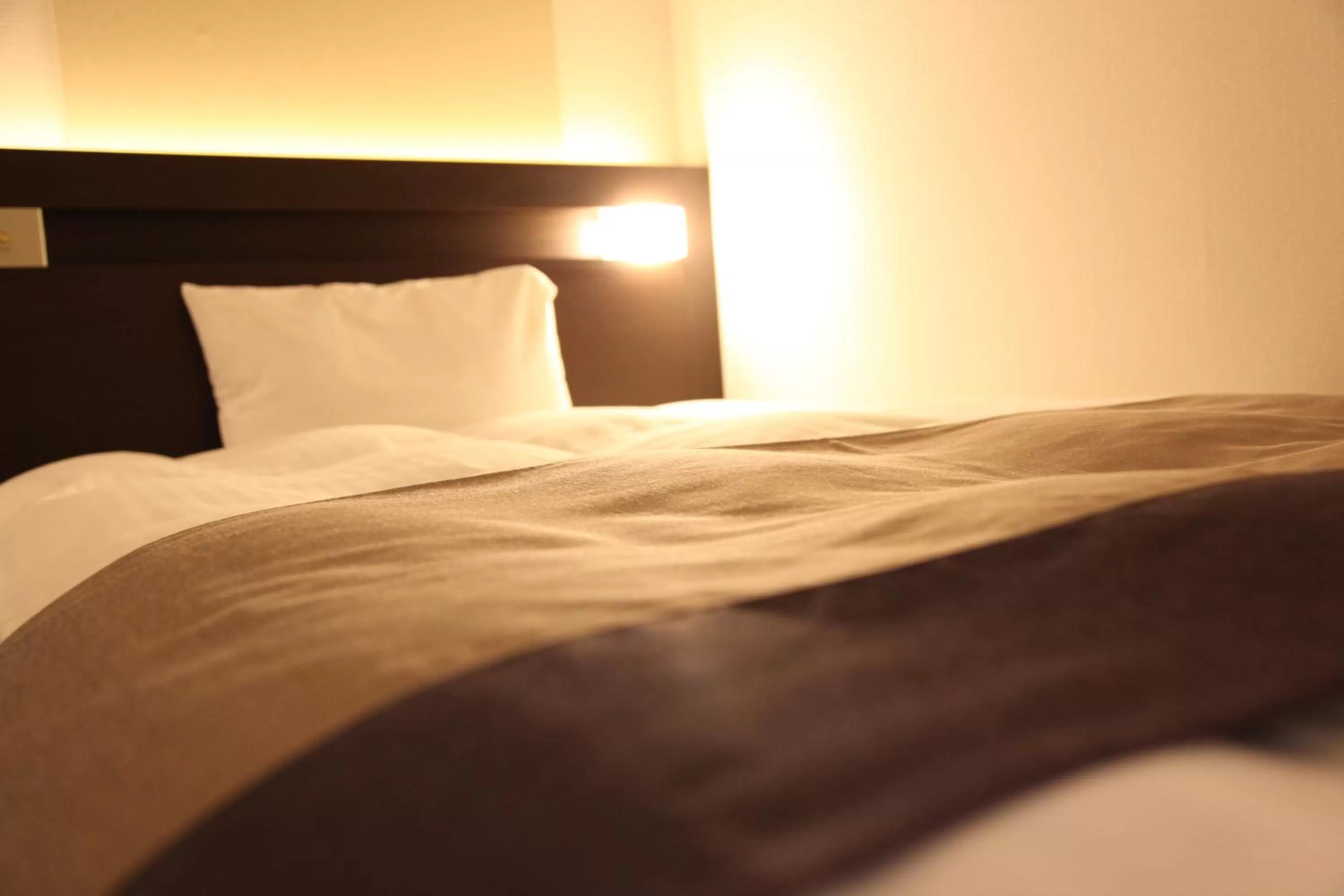 Bed in Urban Hotel Kyoto