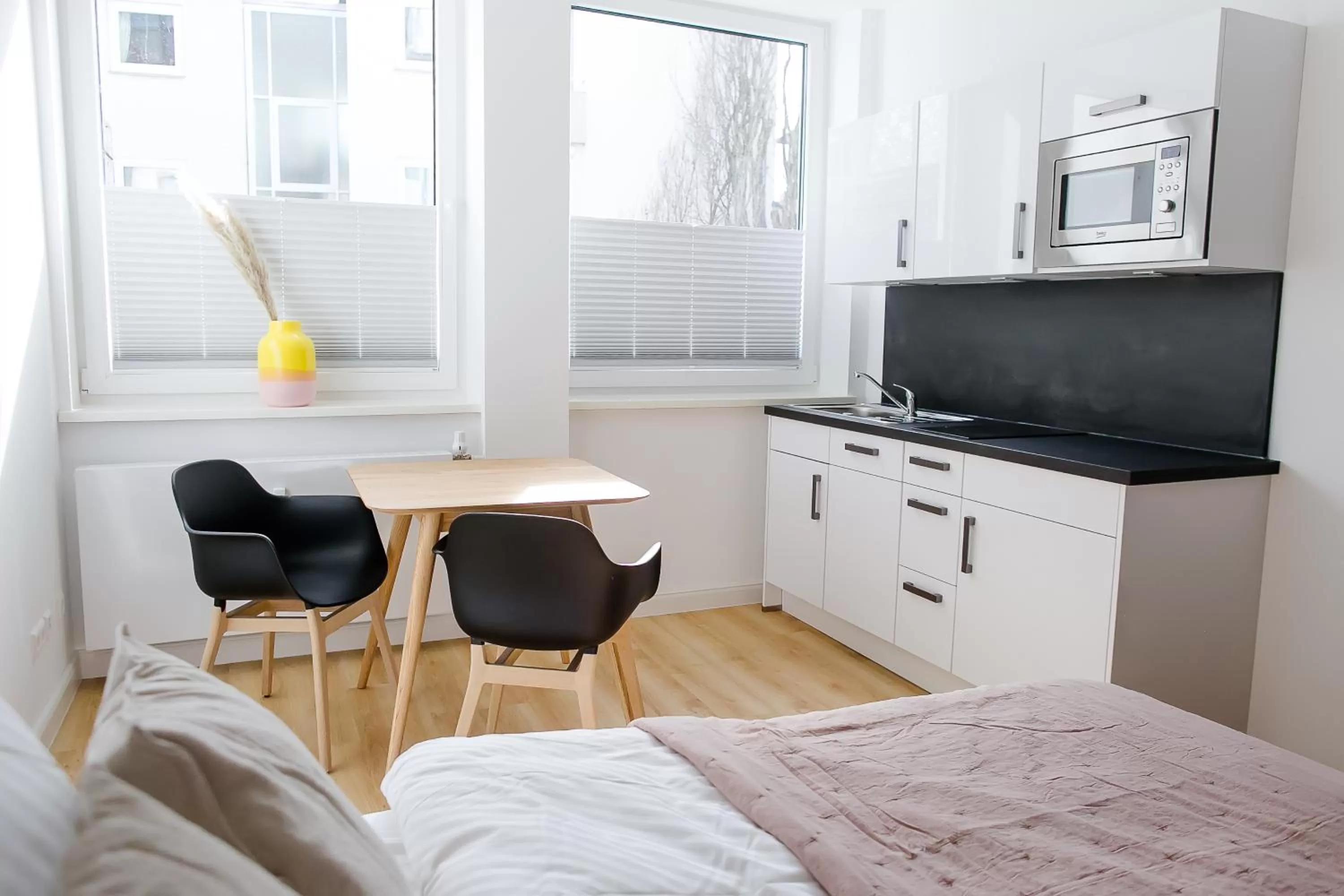 Kitchen or kitchenette, Bed in Louis & Louise Apartments & Rooms I Digital Check In