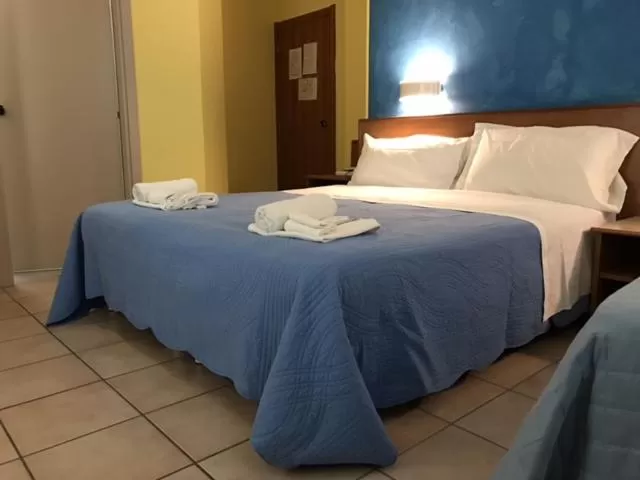 Bed in Hotel Pellegrino E Pace