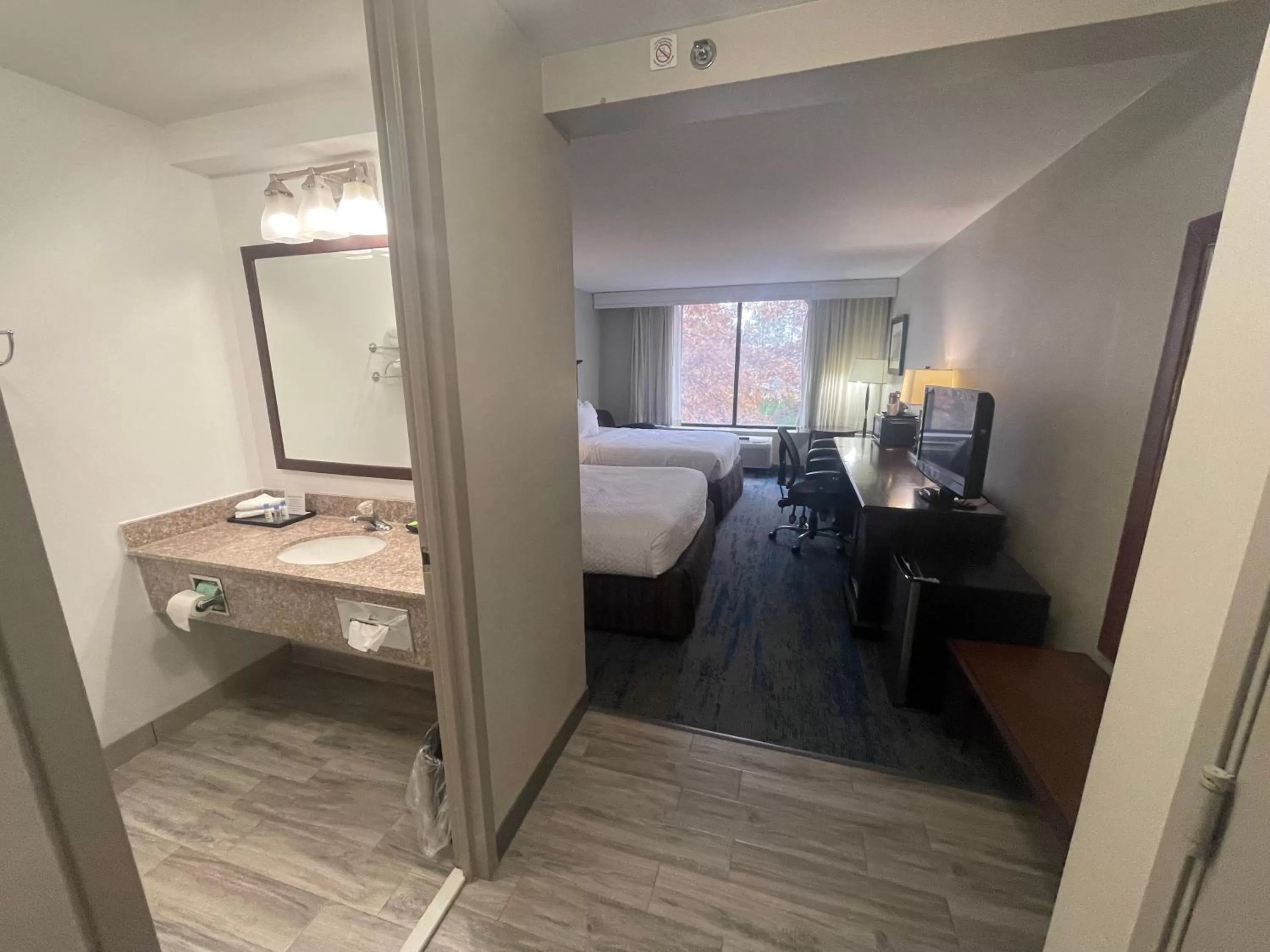 Photo of the whole room, Bed in Ramada by Wyndham Cleveland Independence