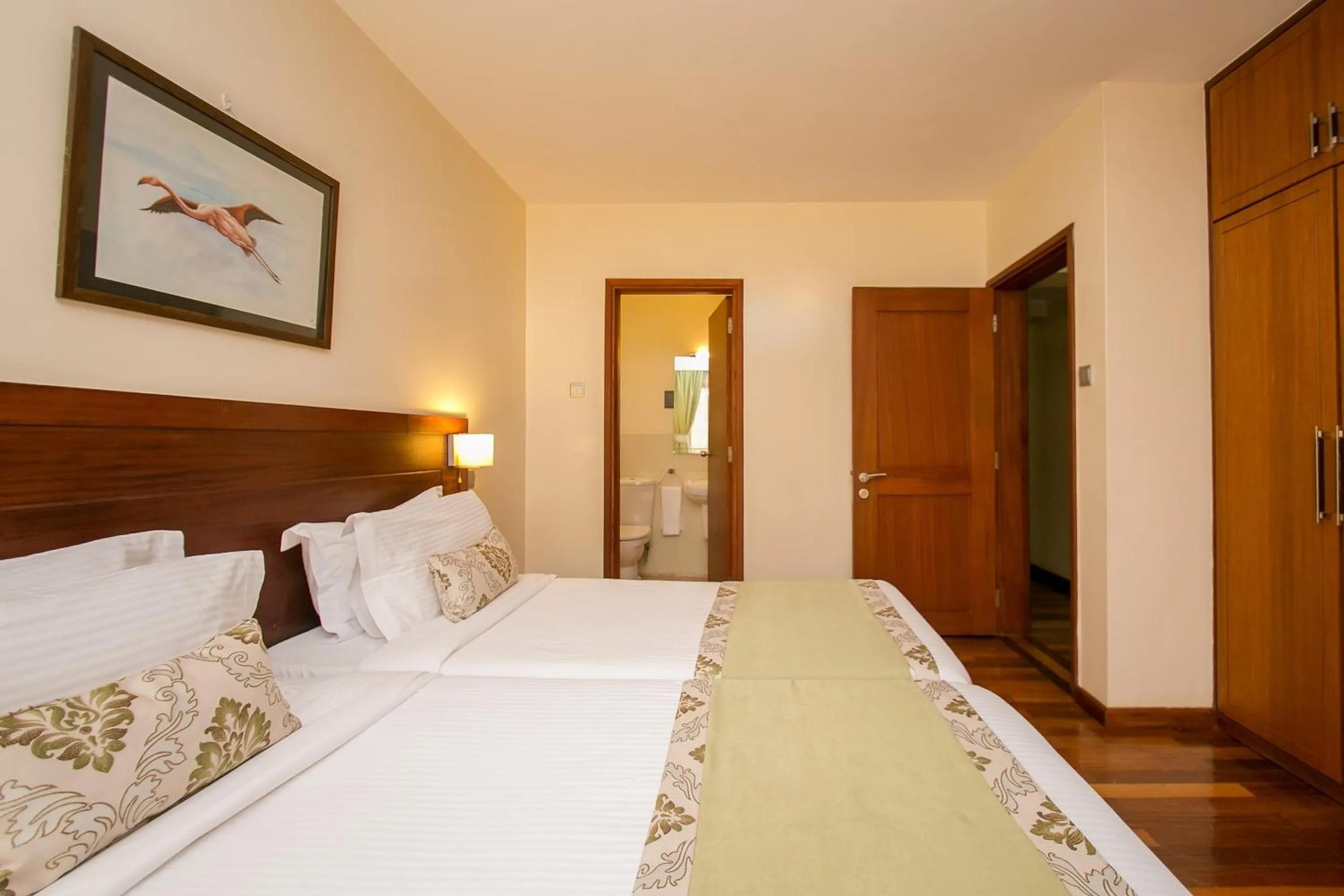 Bedroom, Bed in Waridi Paradise Hotel and Suites