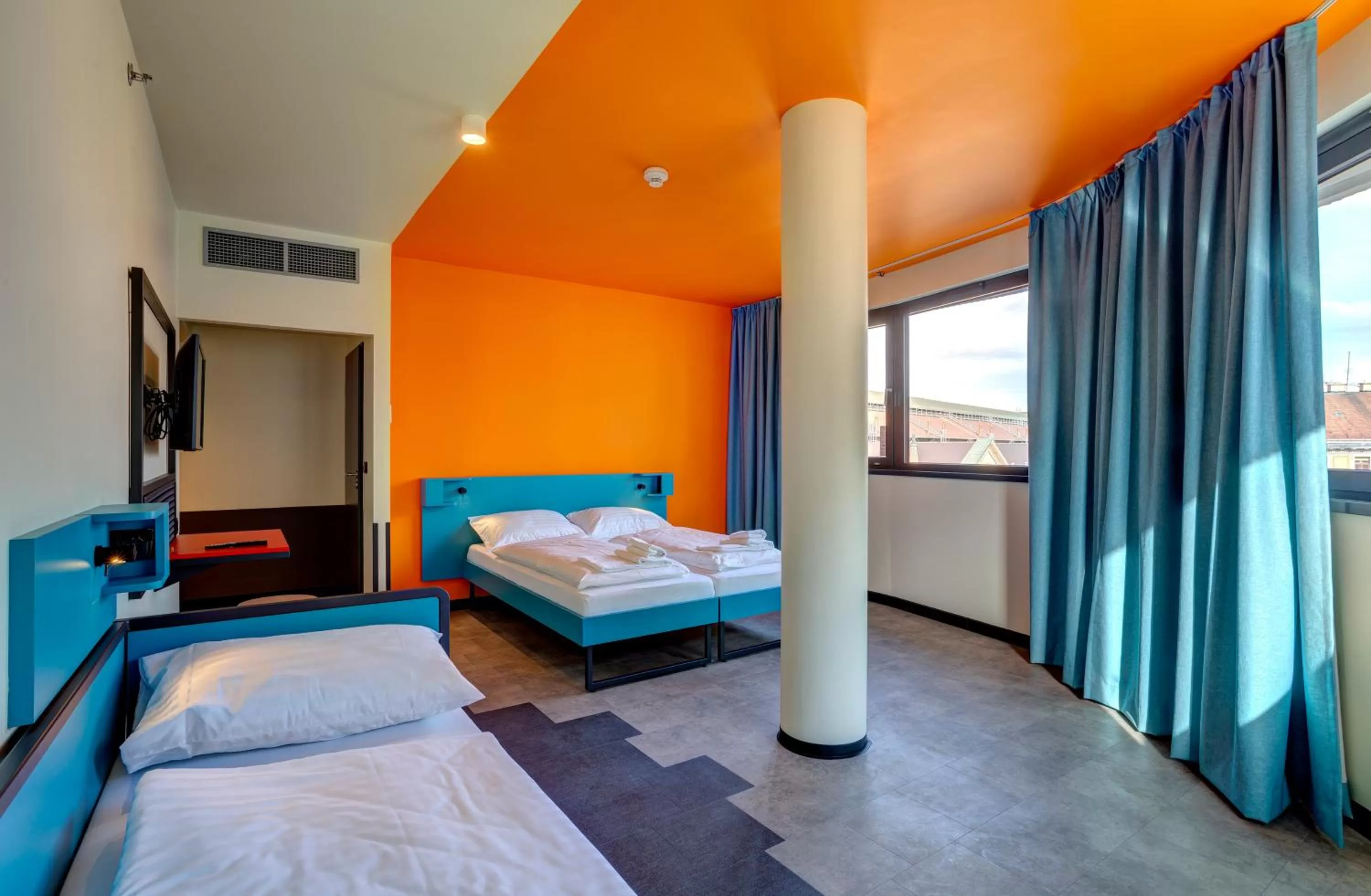 Photo of the whole room, Bed in MEININGER Budapest Great Market Hall