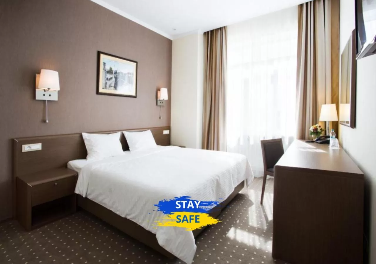 Bed in Alexandrovskiy Hotel