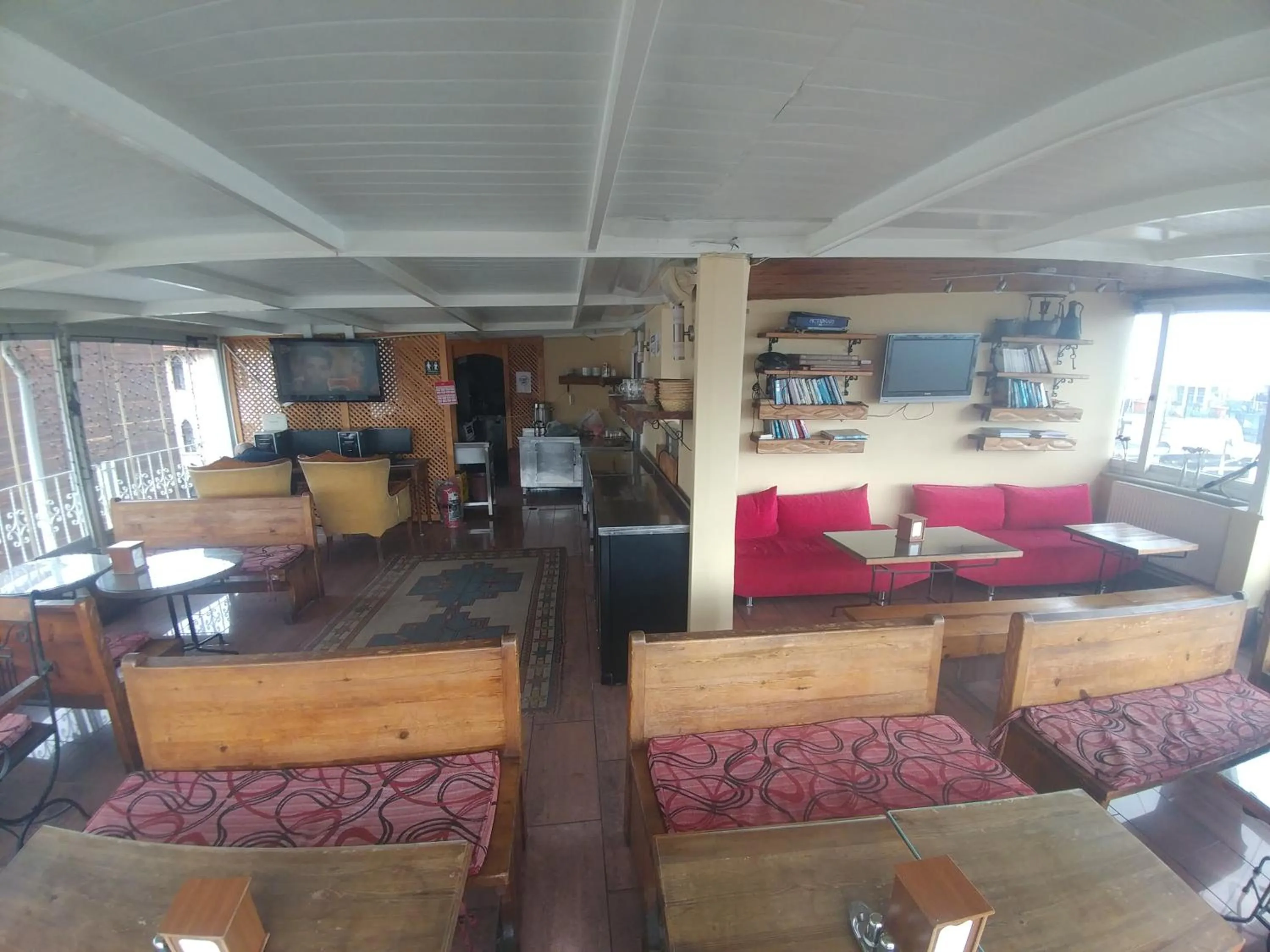 Communal lounge/ TV room in Antique Hostel