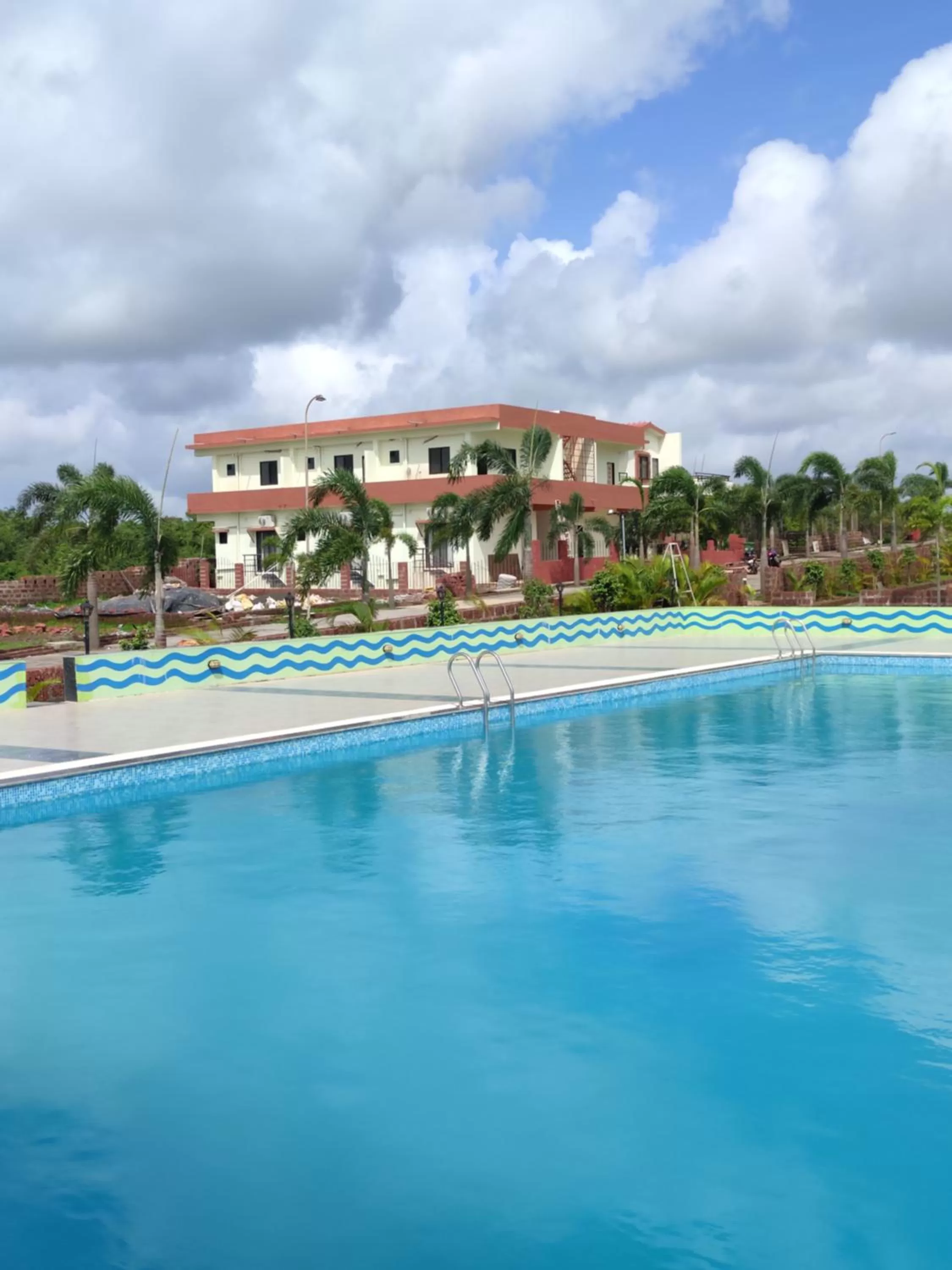 Swimming pool in Mango Valley Resort Ganpatipule
