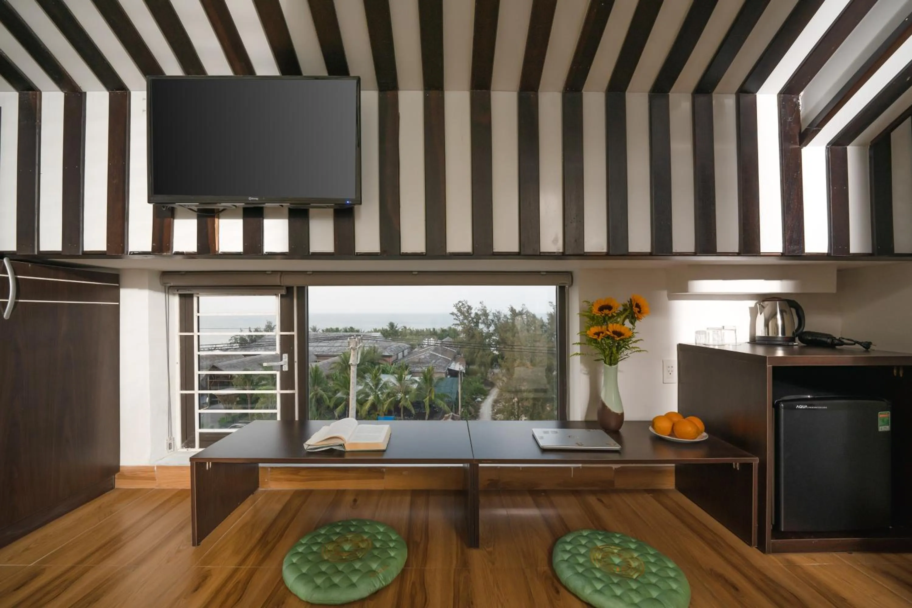 Communal lounge/ TV room in Viet Long Hoian Beach Hotel - STAY 24H