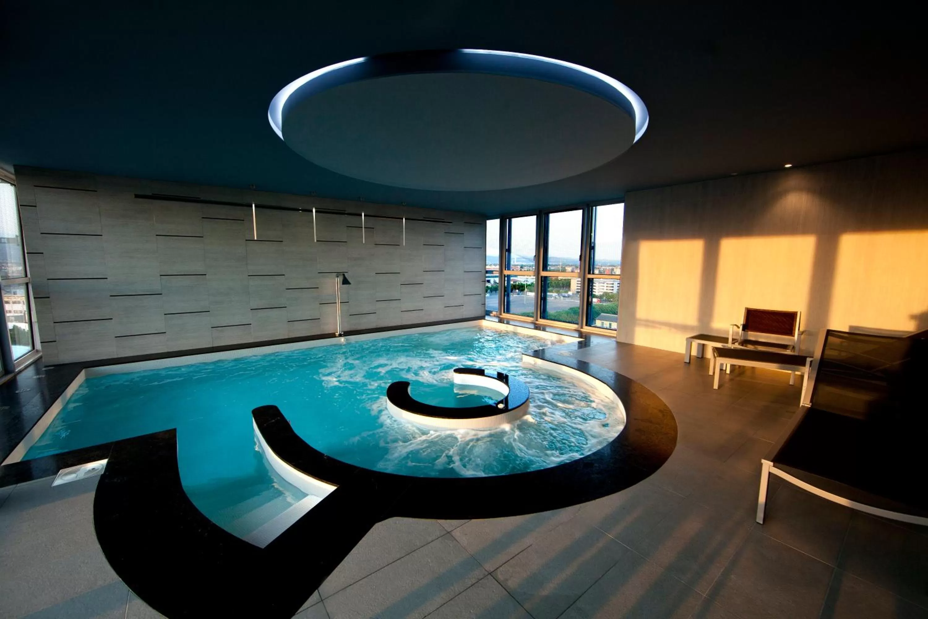 Swimming pool in Crowne Plaza Verona Fiera by IHG