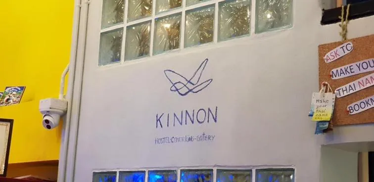 Property logo or sign in Kinnon Deluxe Hostel Coworking Cafe