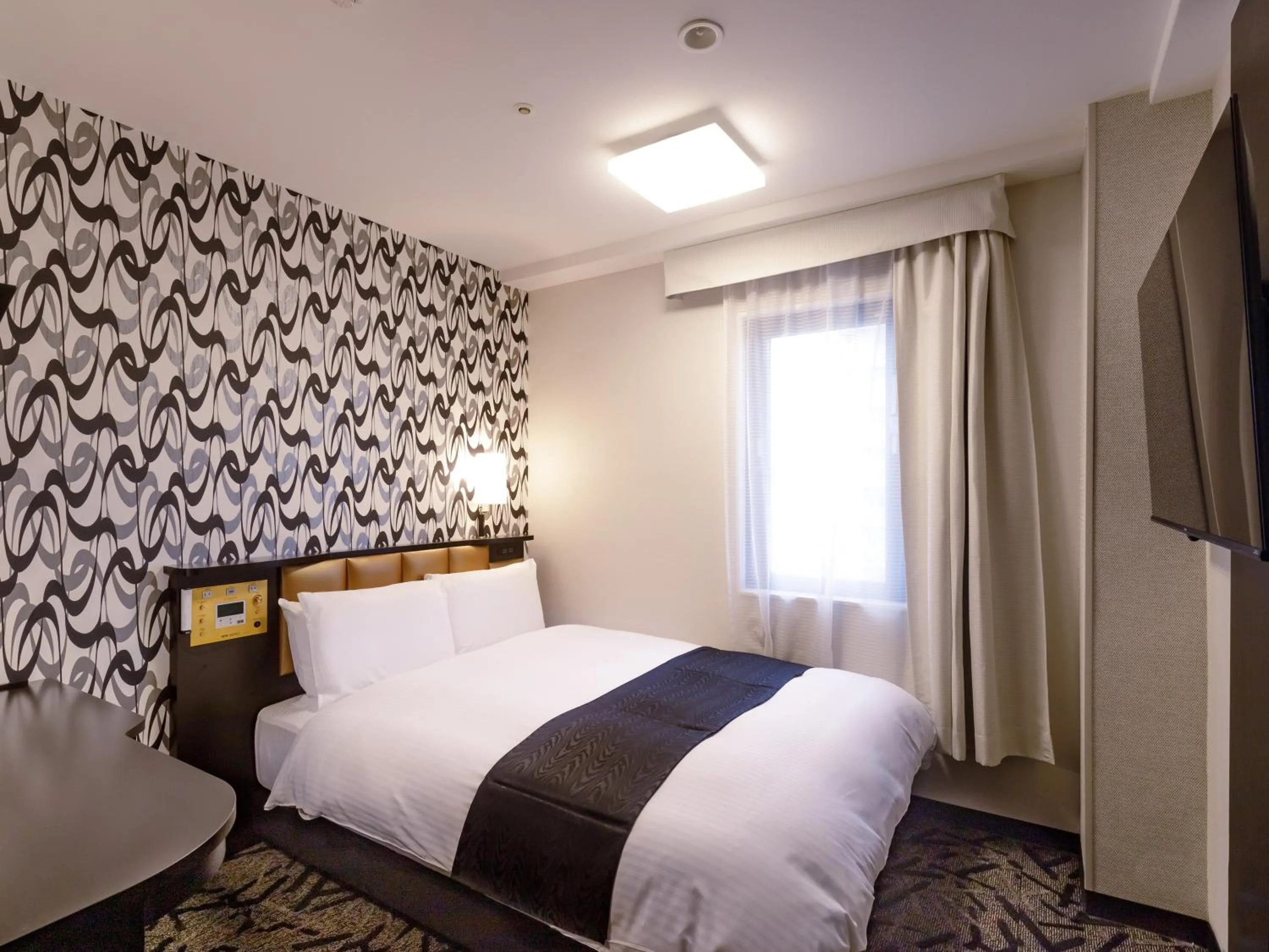 Photo of the whole room, Bed in APA Hotel STAY Toyama