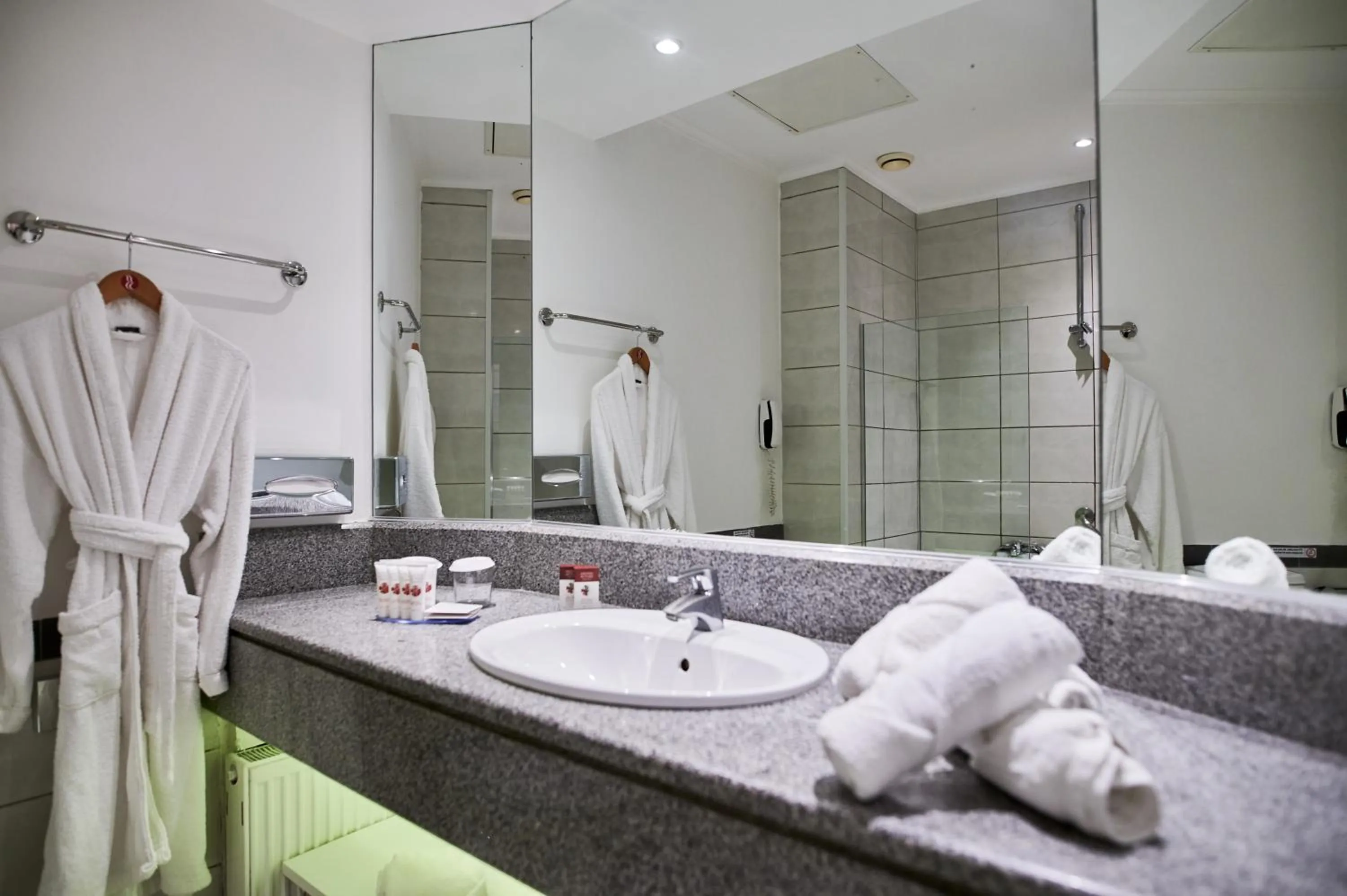 Bathroom in Ramada Plaza by Wyndham Thraki