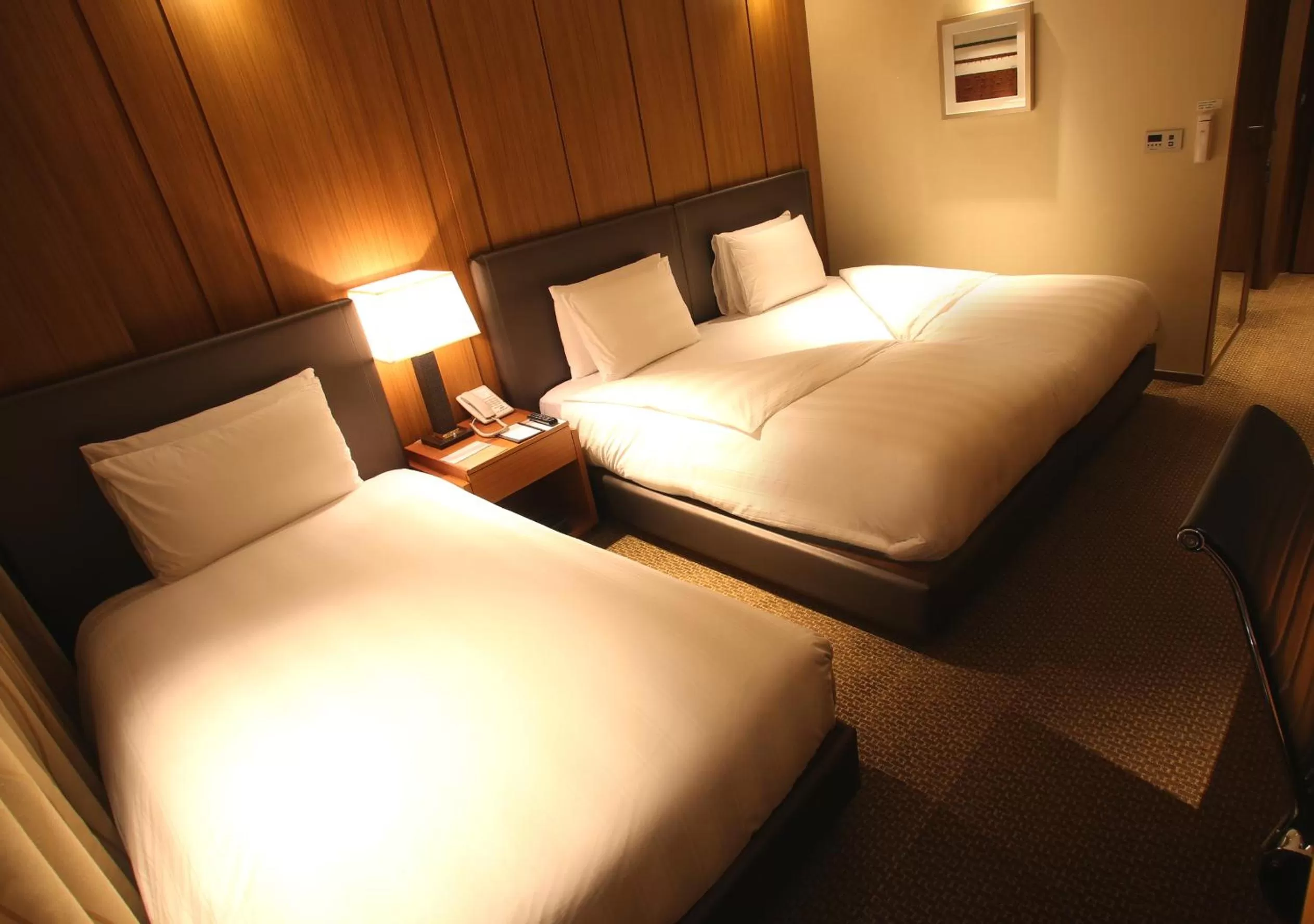 Bed in LOTTE CITY HOTEL Daejeon
