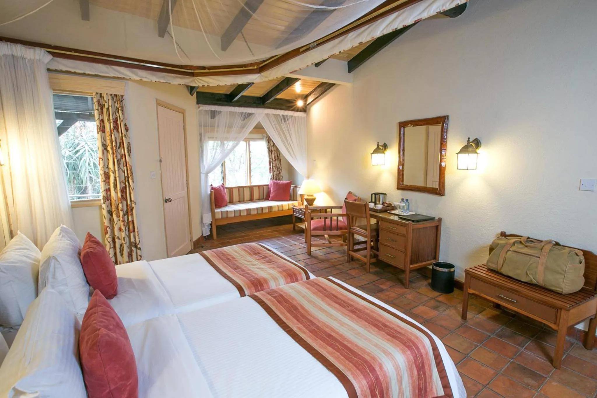 Bed in Sarova Lion Hill Game Lodge