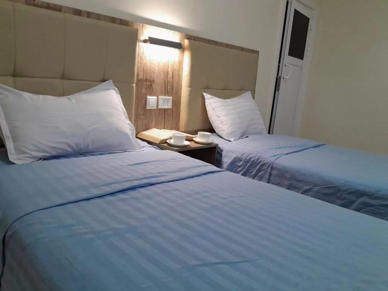 View (from property/room), Bed in Bukhara house hotel