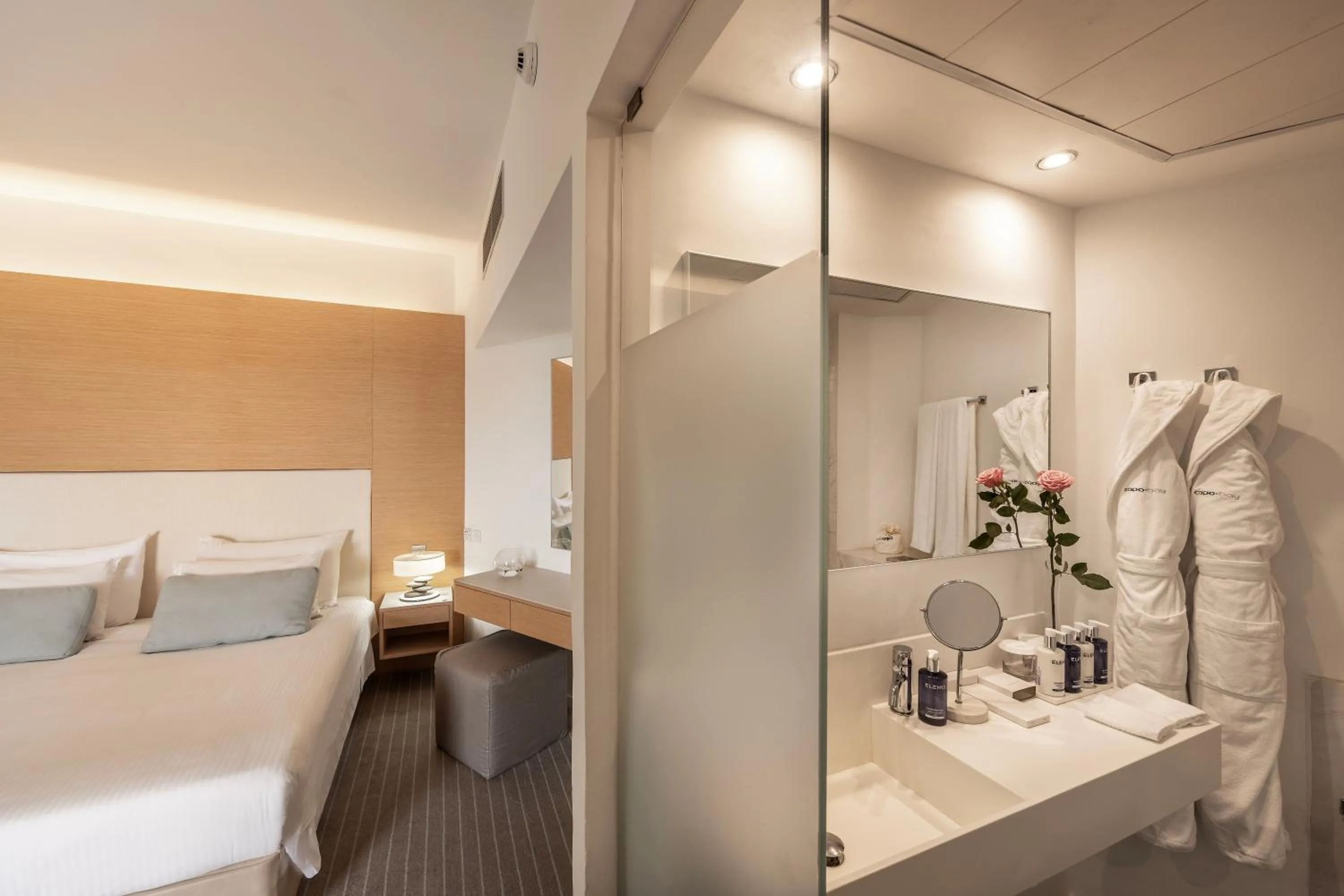 Bed in Capo Bay Hotel