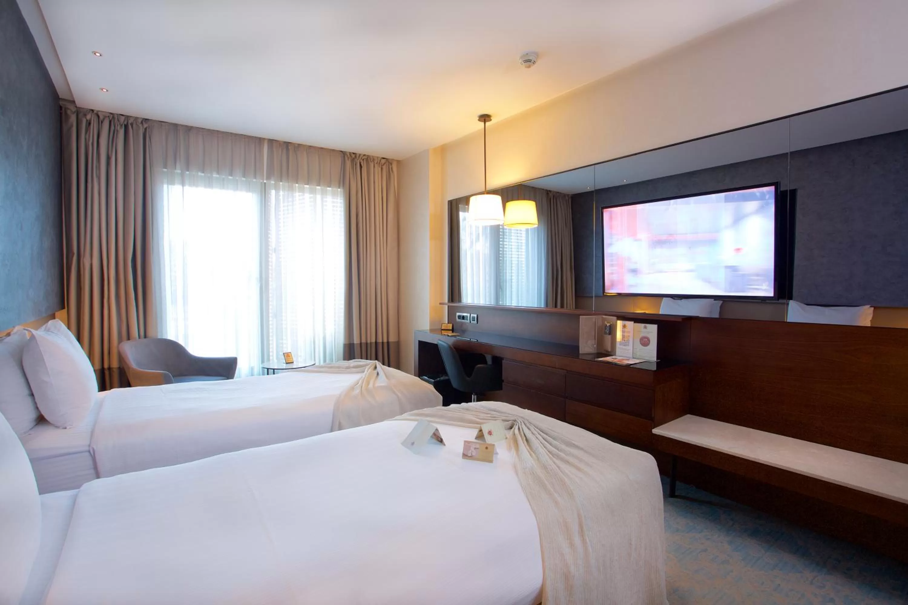 Bed in Dosso Dossi Hotels & SPA Downtown