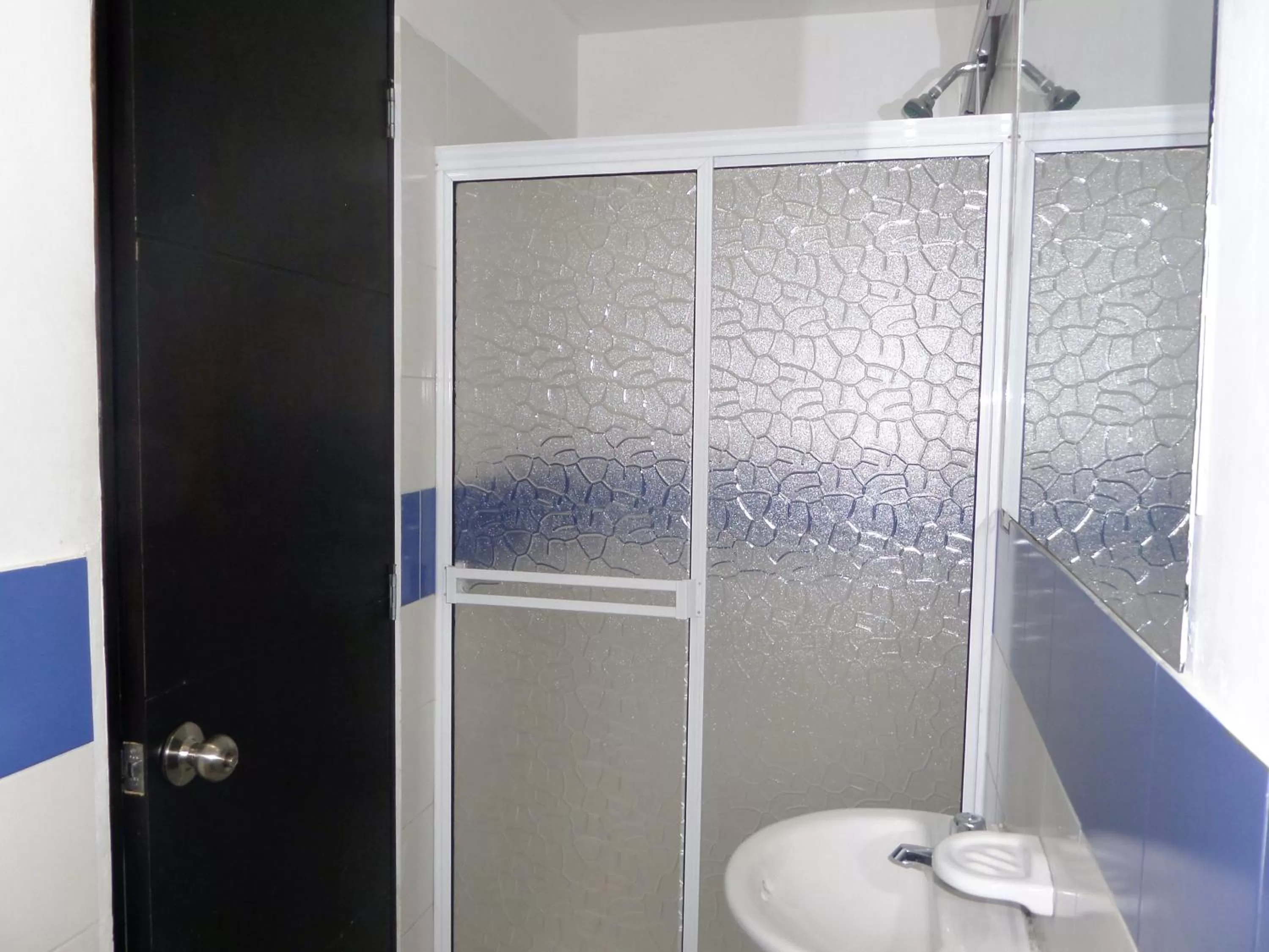 Bathroom in Apartasuites San Marcos