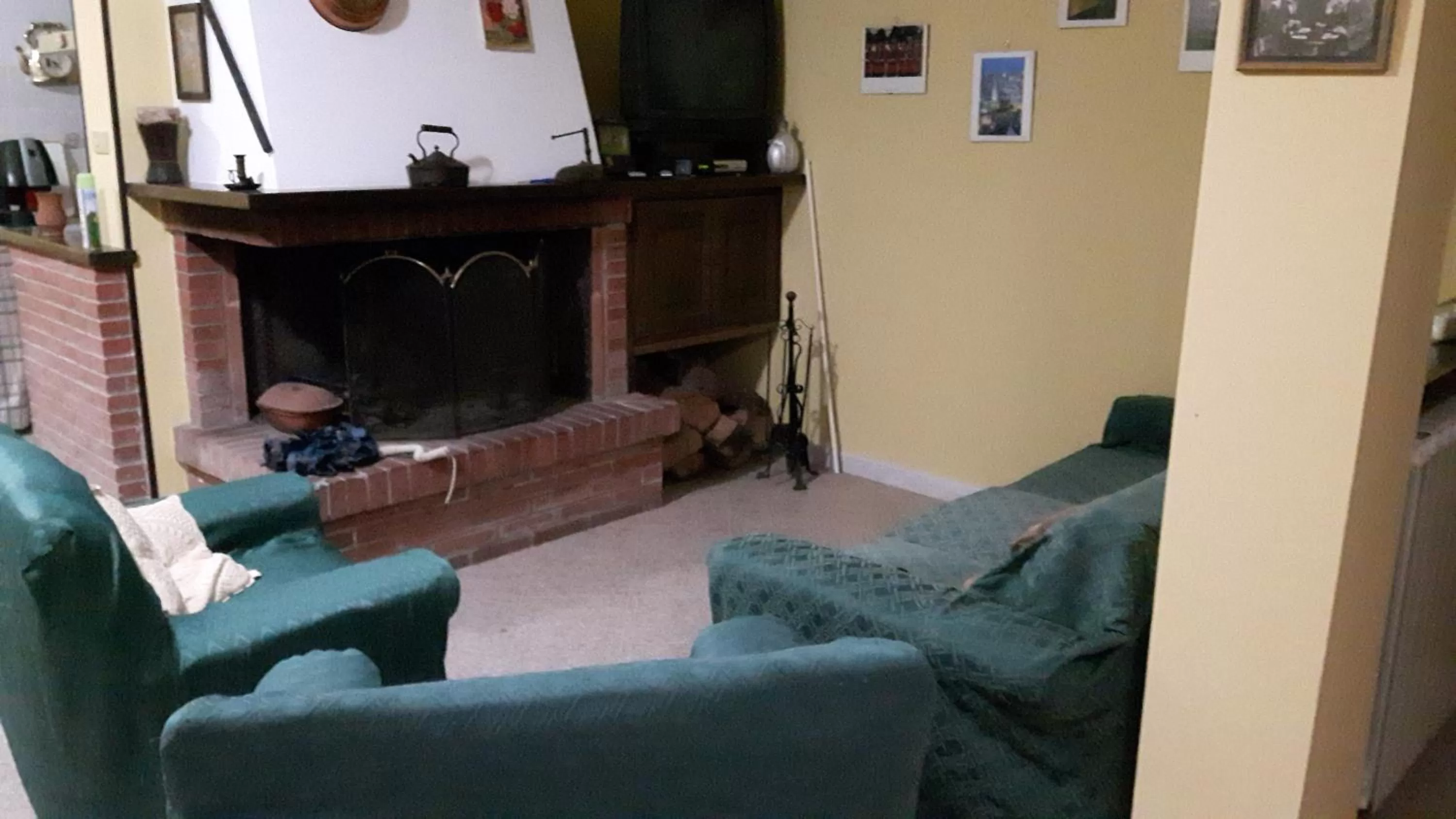 Communal lounge/ TV room in B&B La villetta rossa