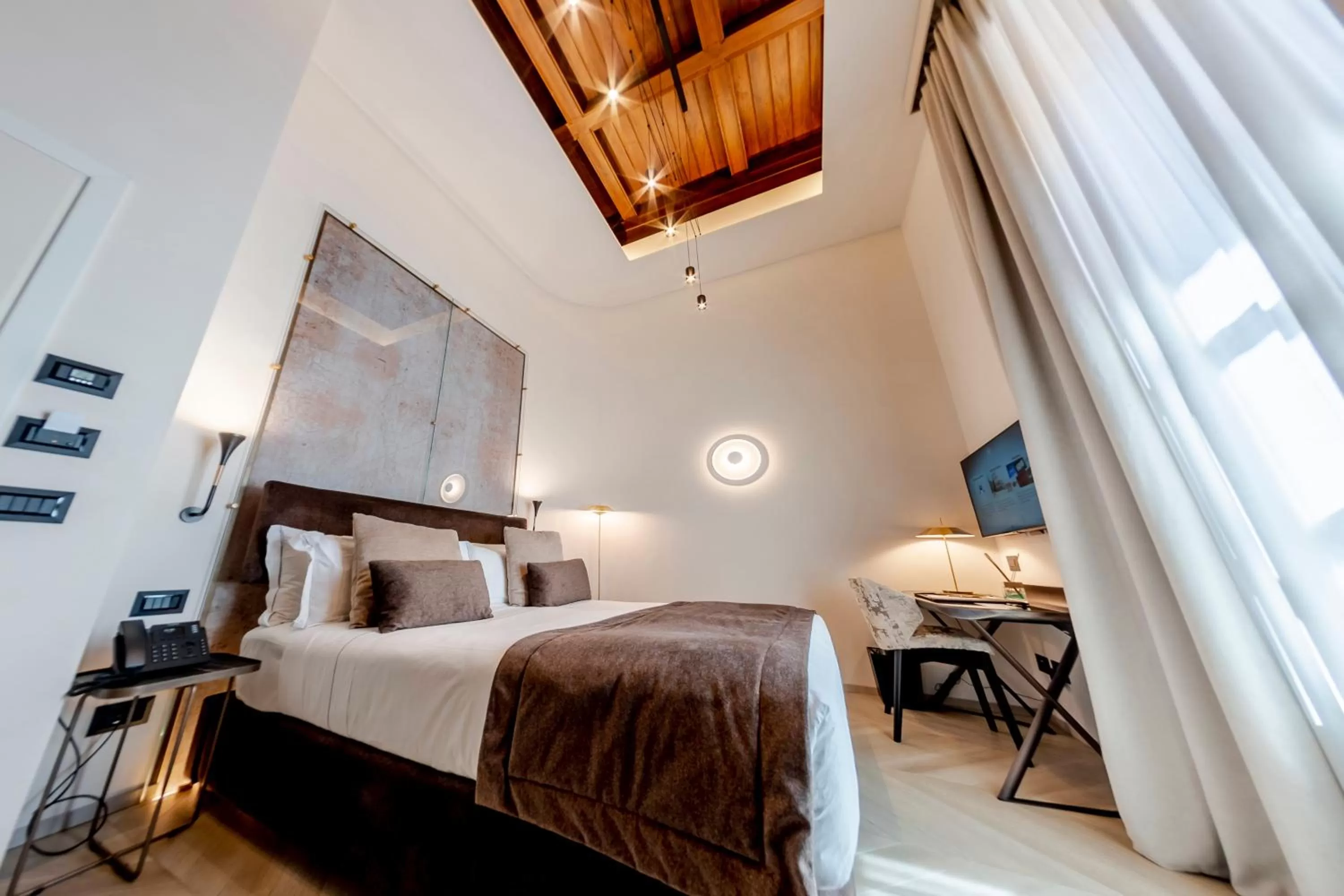 Bed in Martius Private Suites Hotel