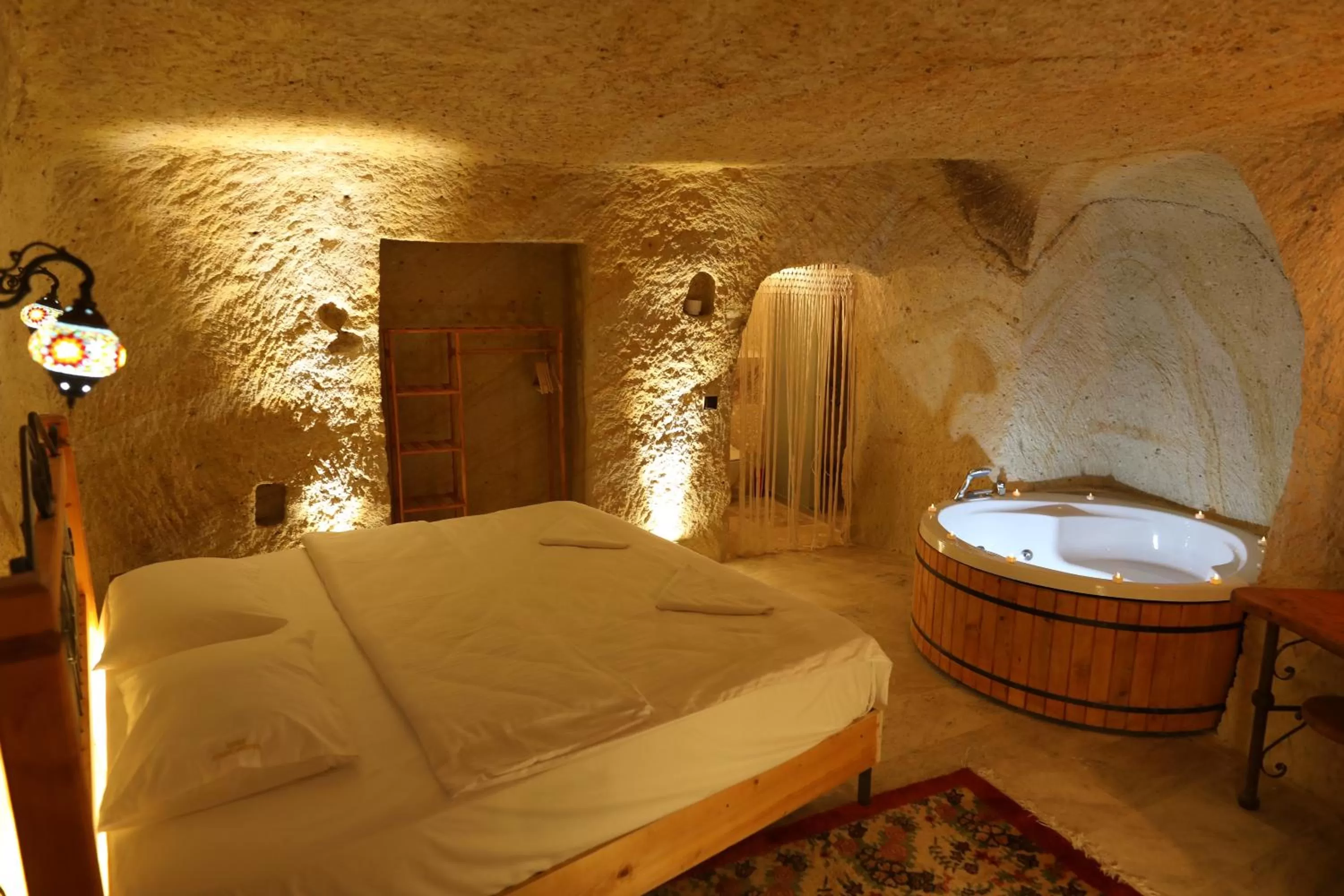 Bed in Atax Cave House