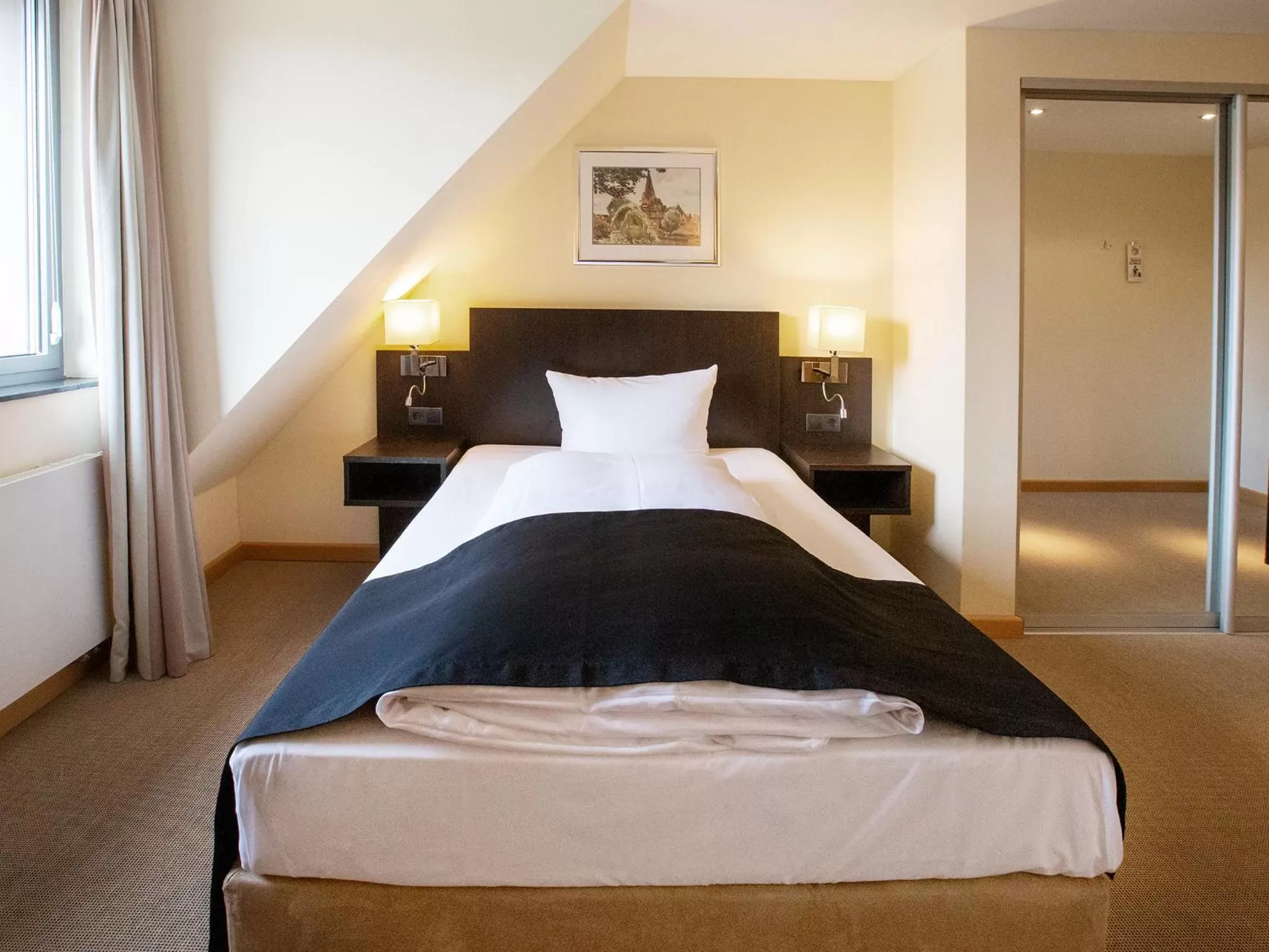 Photo of the whole room, Bed in DORMERO Hotel Altes Kaufhaus Lüneburg