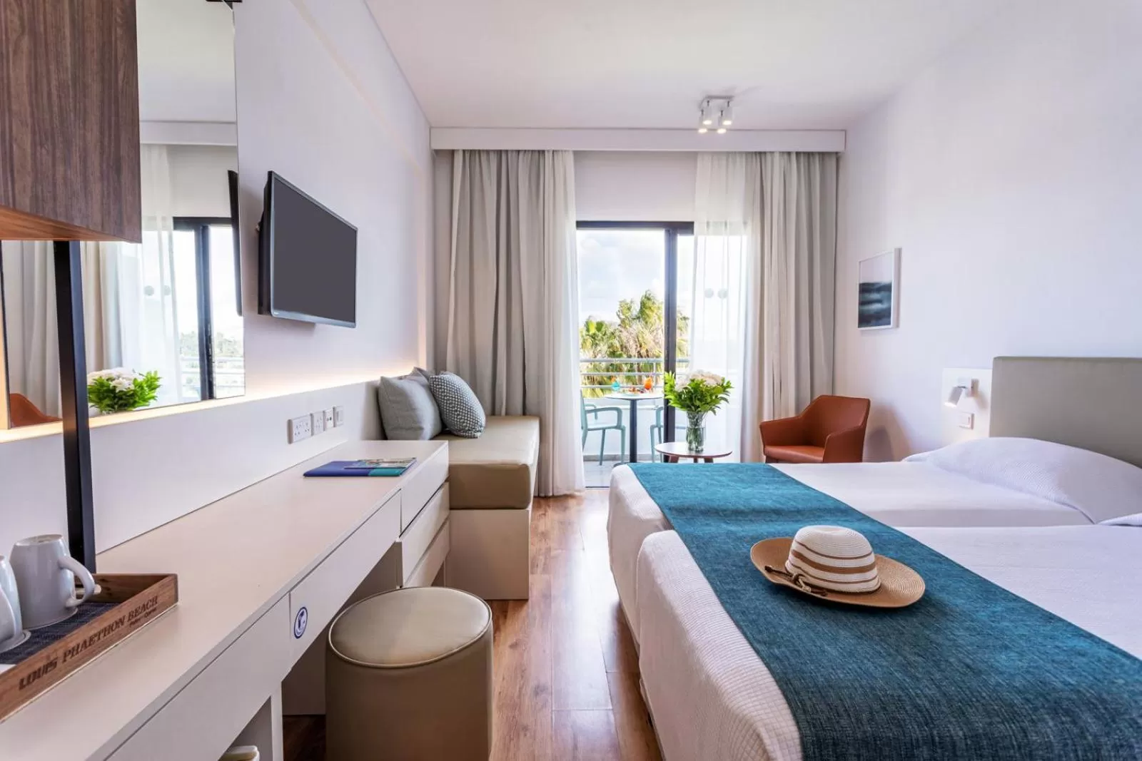 Photo of the whole room, Bed in Louis Phaethon Beach