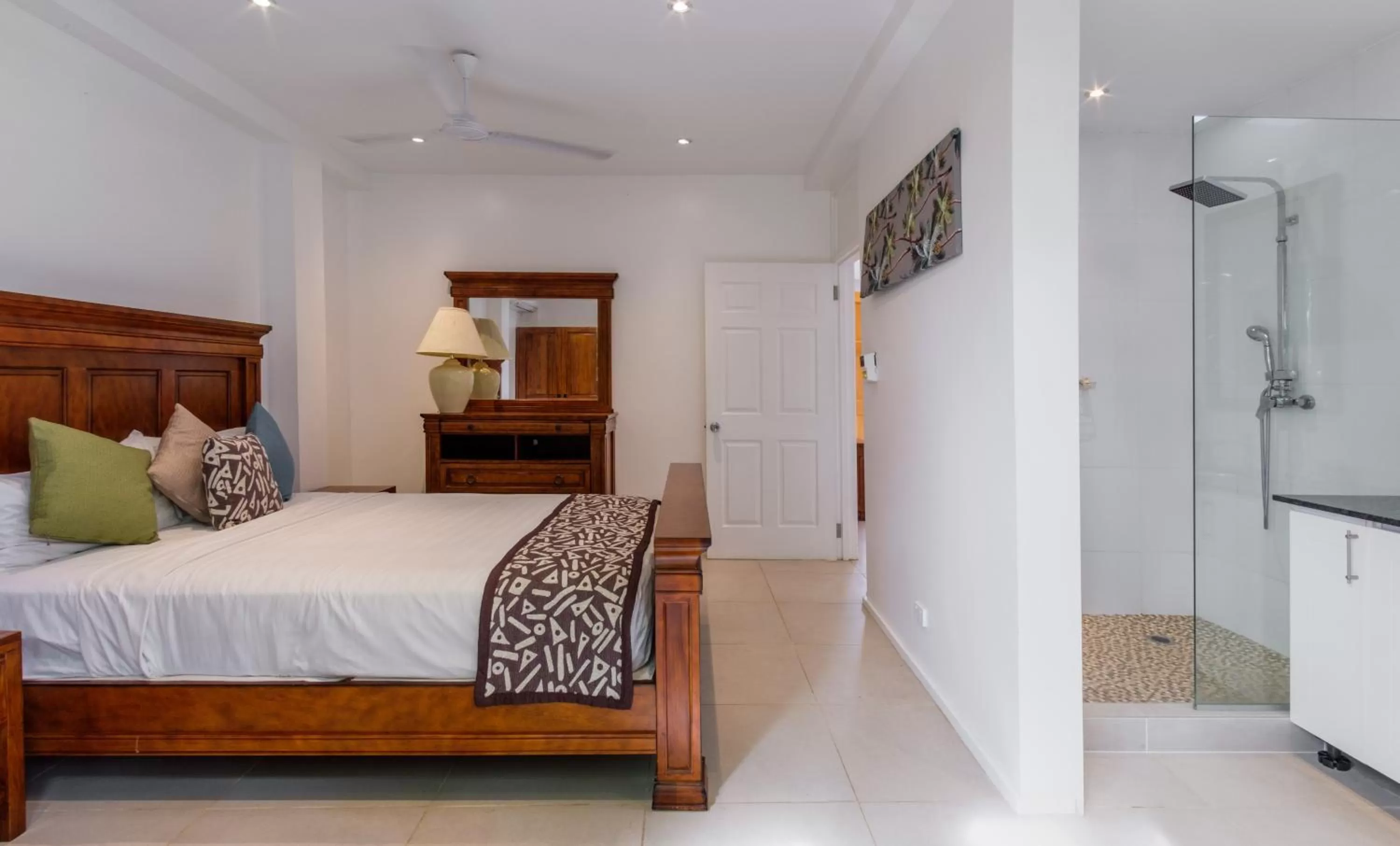 Bathroom, Bed in First Landing Beach Resort & Villas