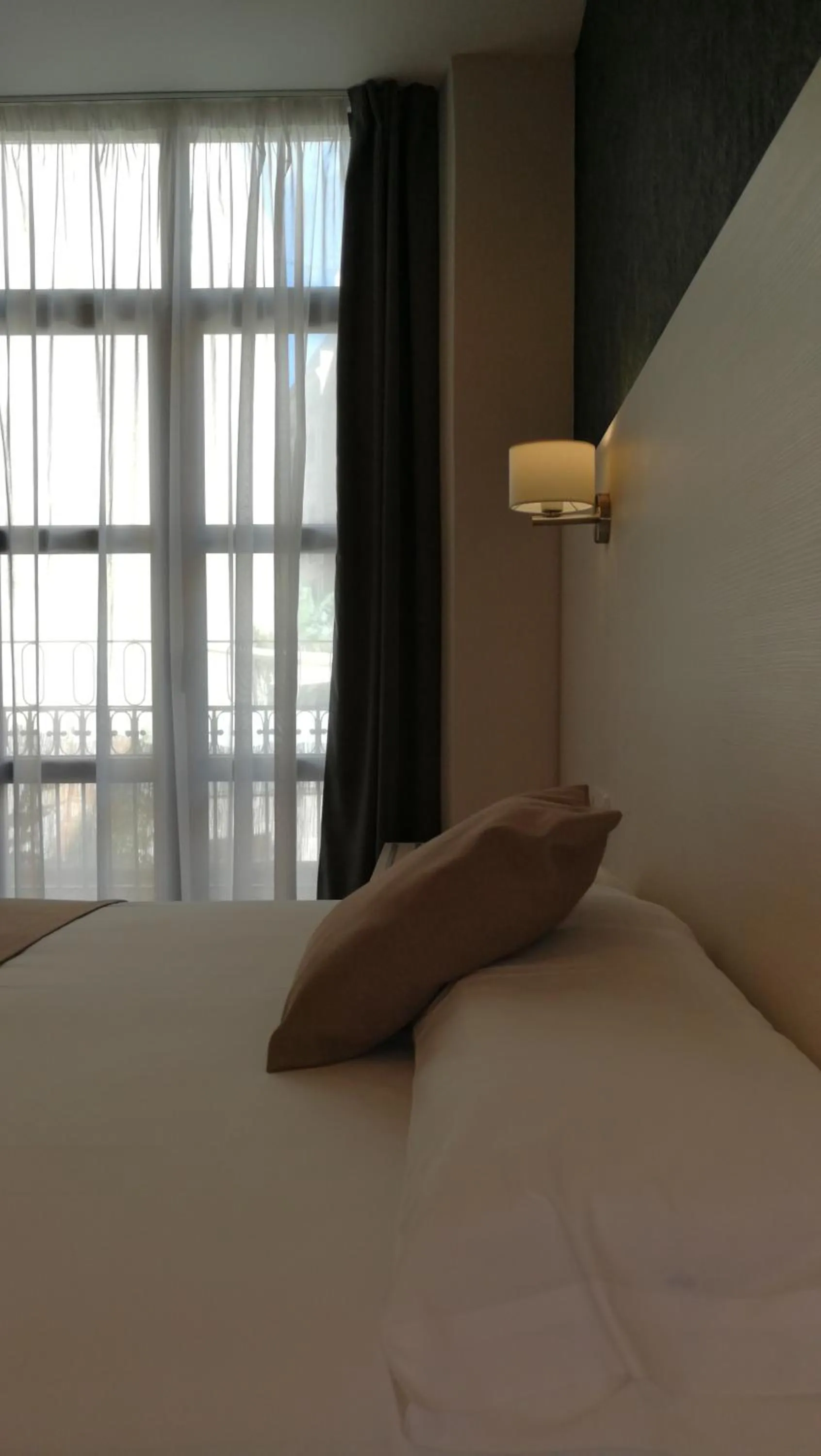 Bed in Hotel Cantón