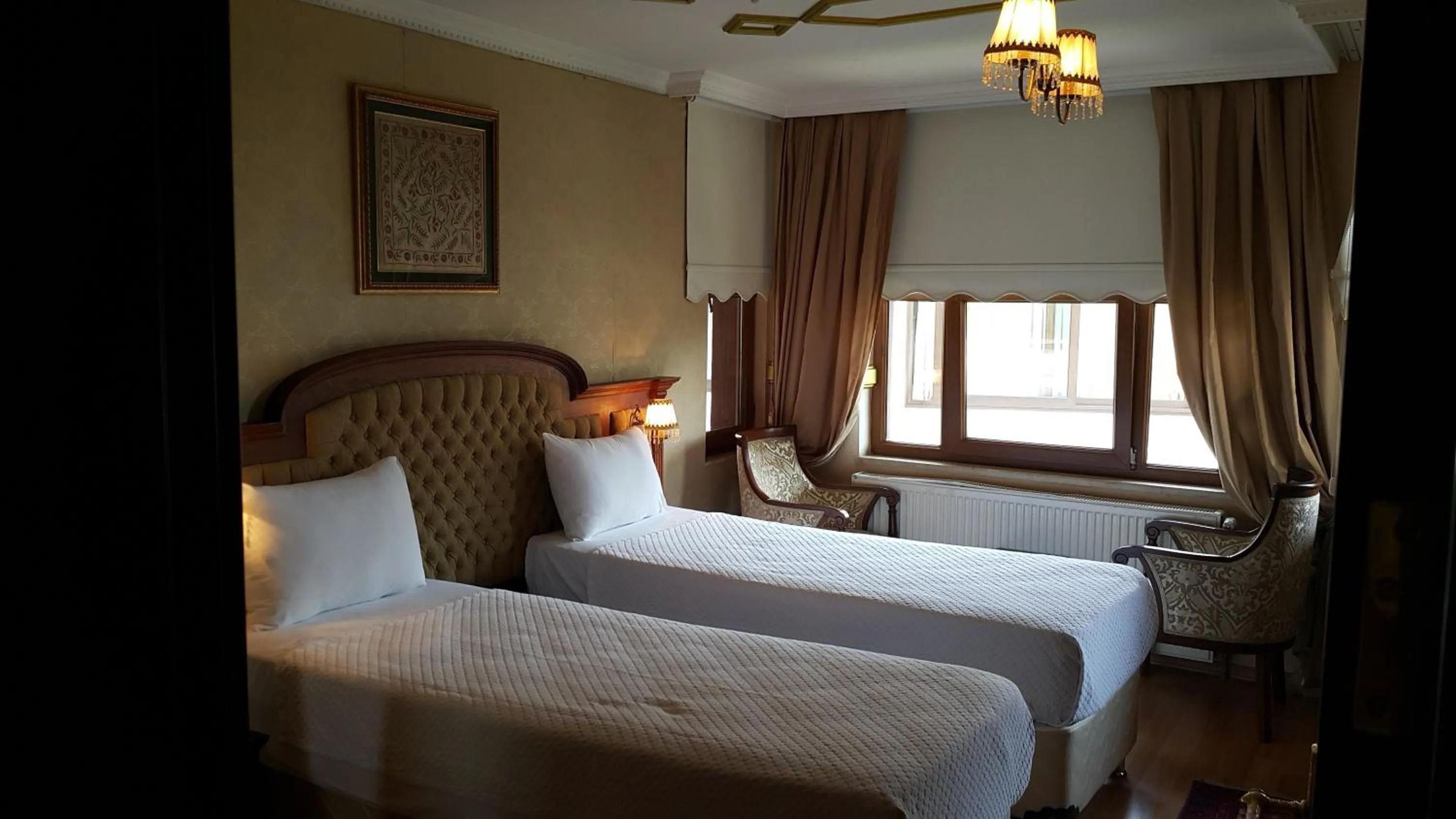 Bed in Aruna Boutique Hotel