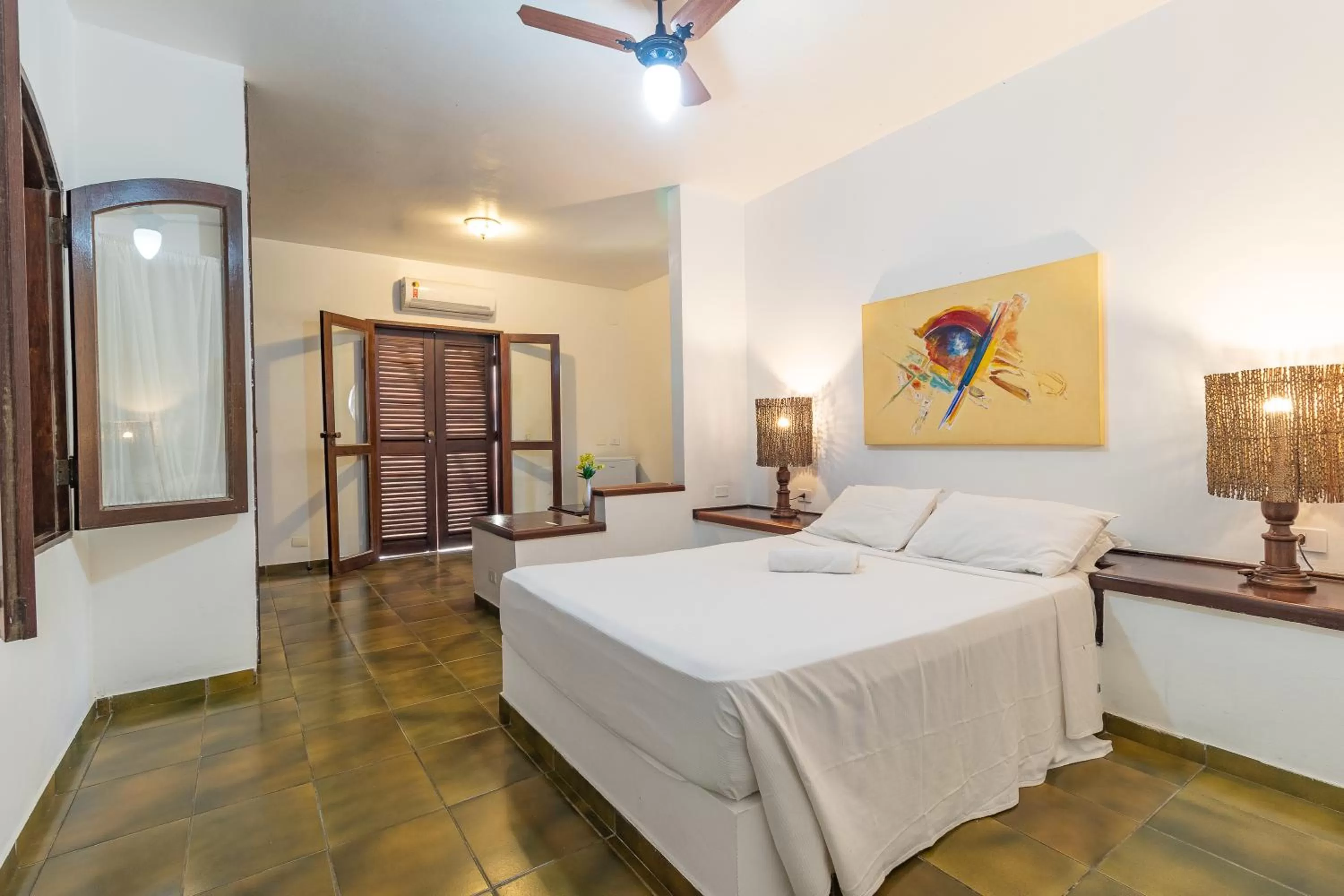 Bed in Pousada Casa Amarela