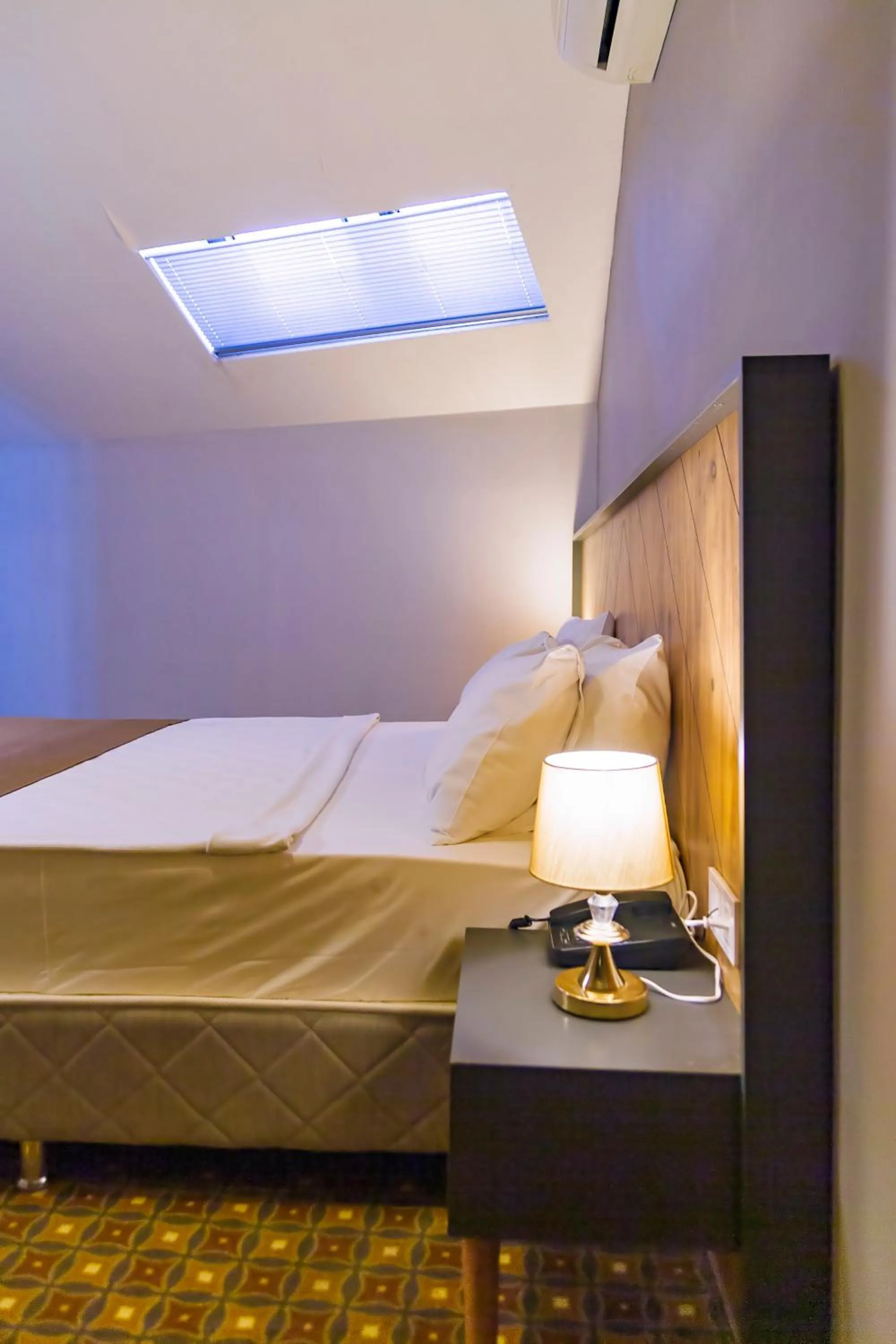 Bed in PRIVADO HOTELS