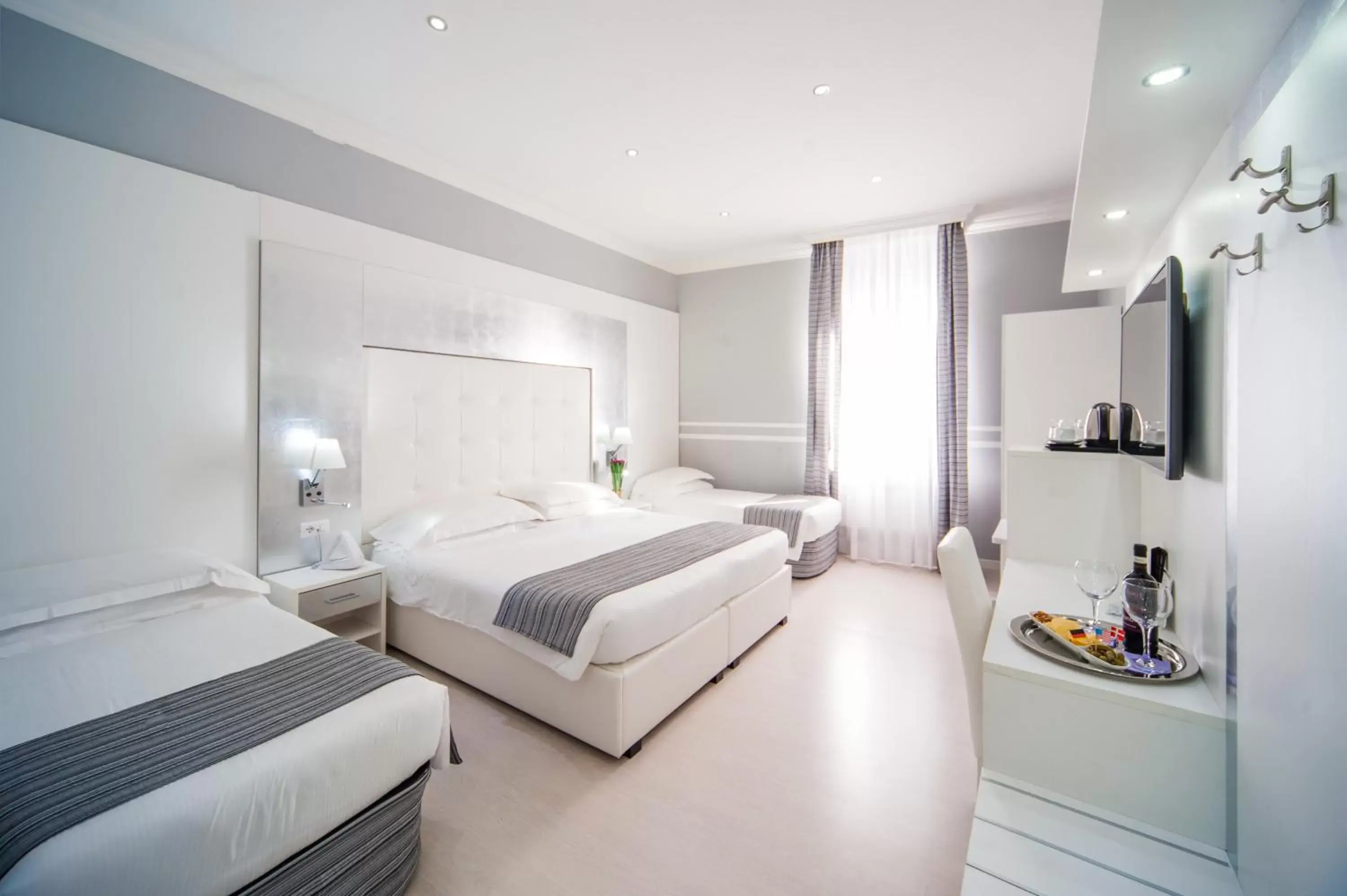 Deluxe Quadruple Room in Relais Trevi 95 Boutique Hotel Deluxe Quadruple Room in Relais Trevi 95 Boutique Hotel