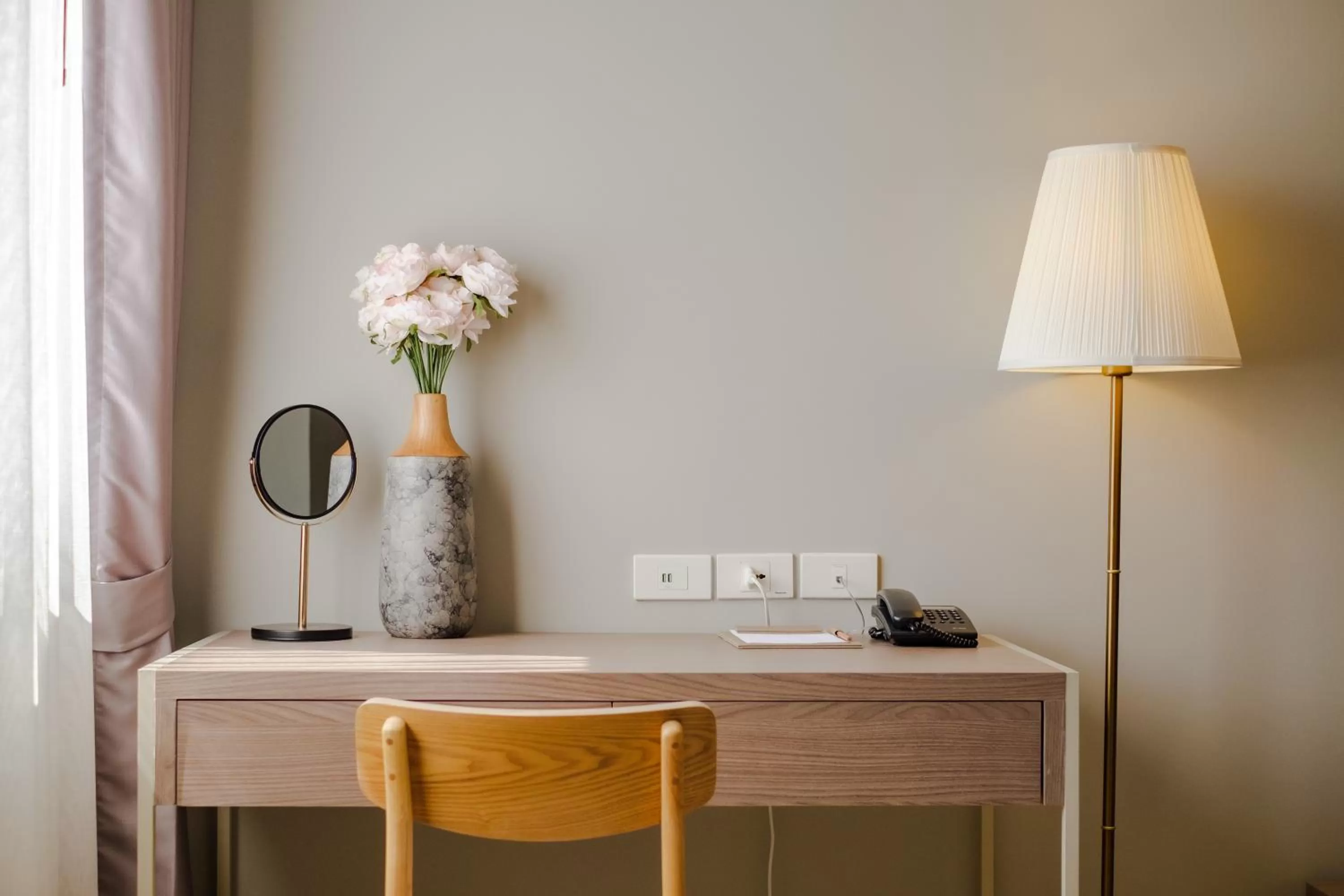 Communal lounge/ TV room in The Rise Suites Hotel, Chiang Mai - SHA Extra Plus