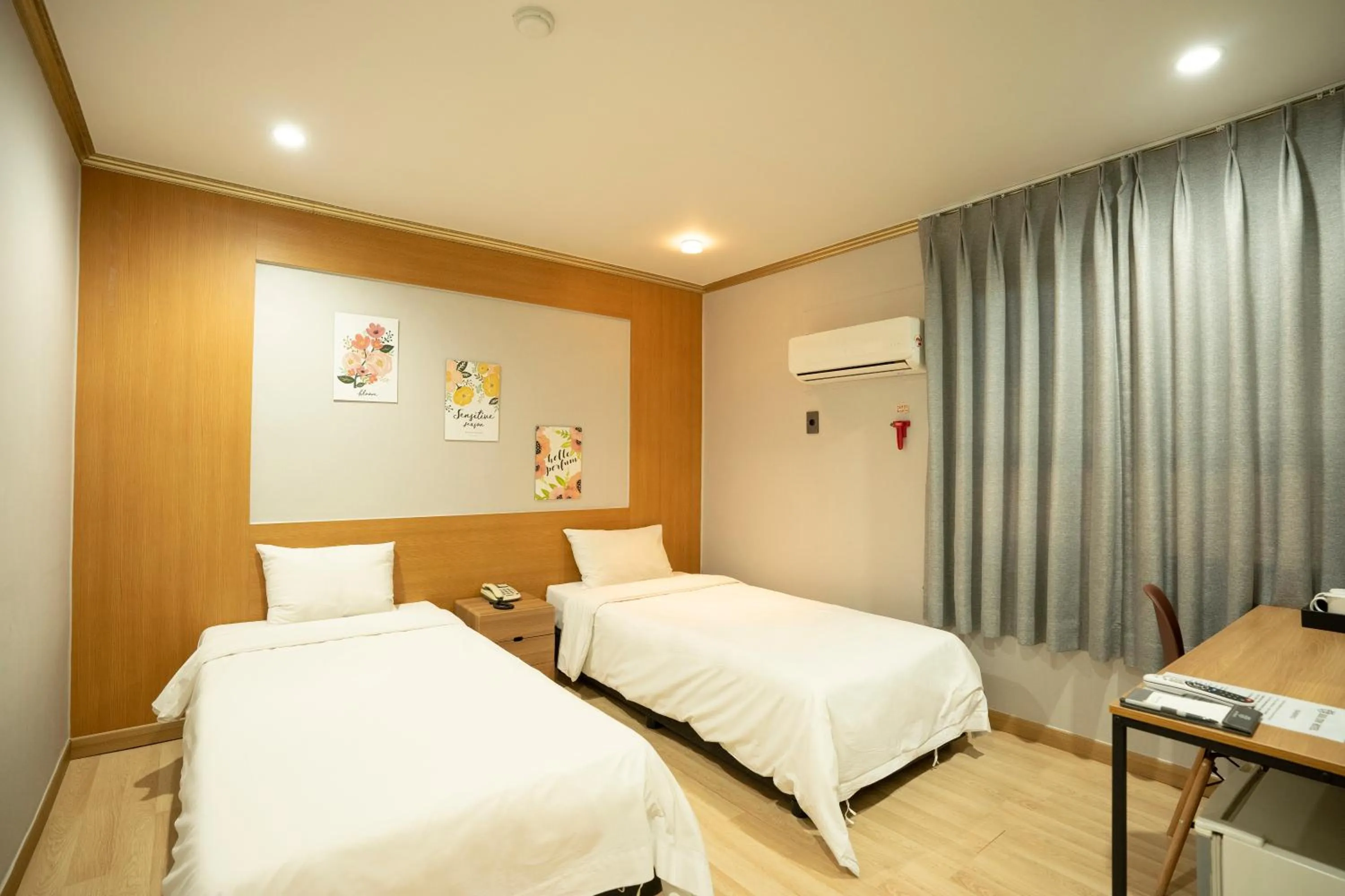 Bed in Jeju Stay Hotel