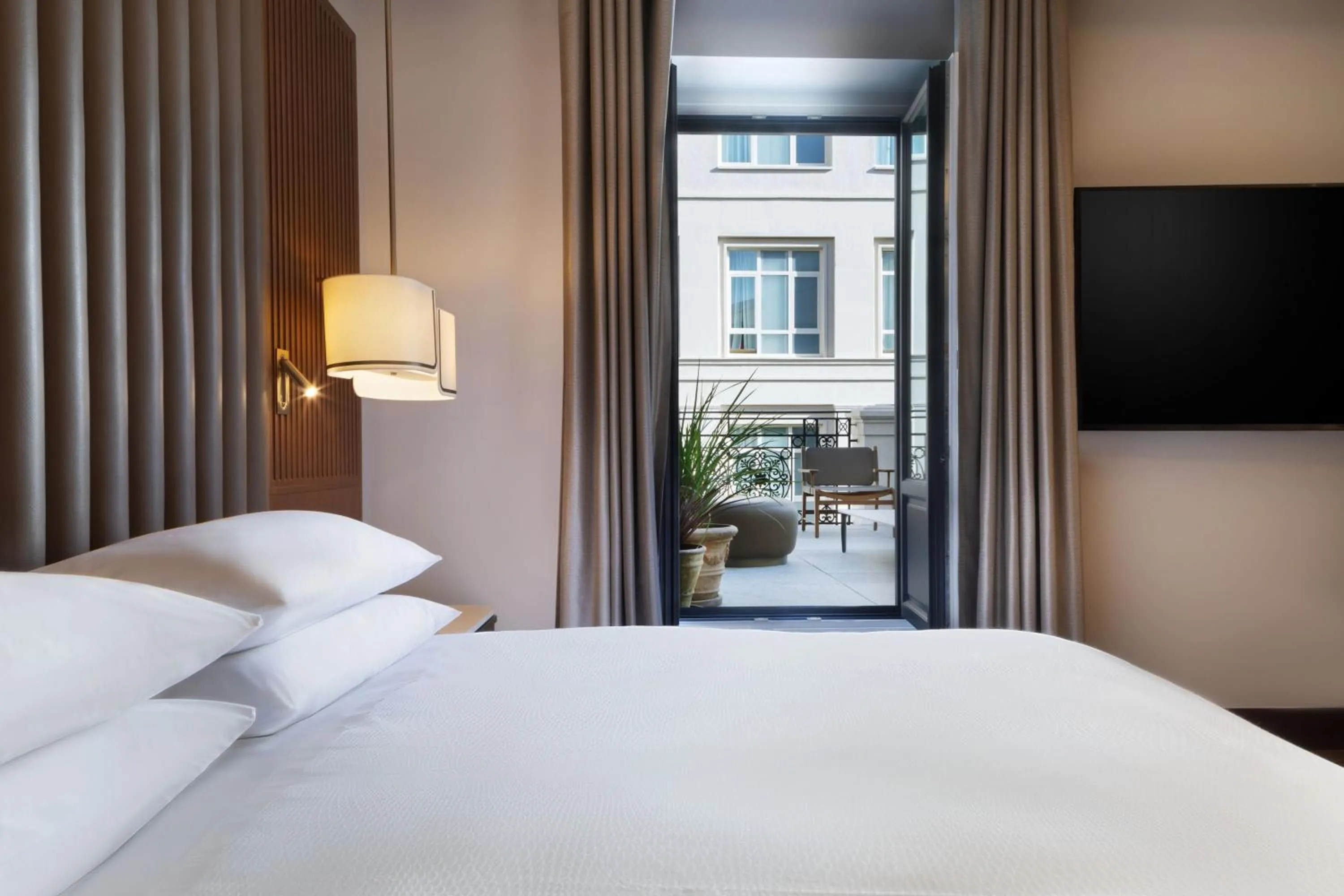 Photo of the whole room, Bed in JW Marriott Hotel Madrid