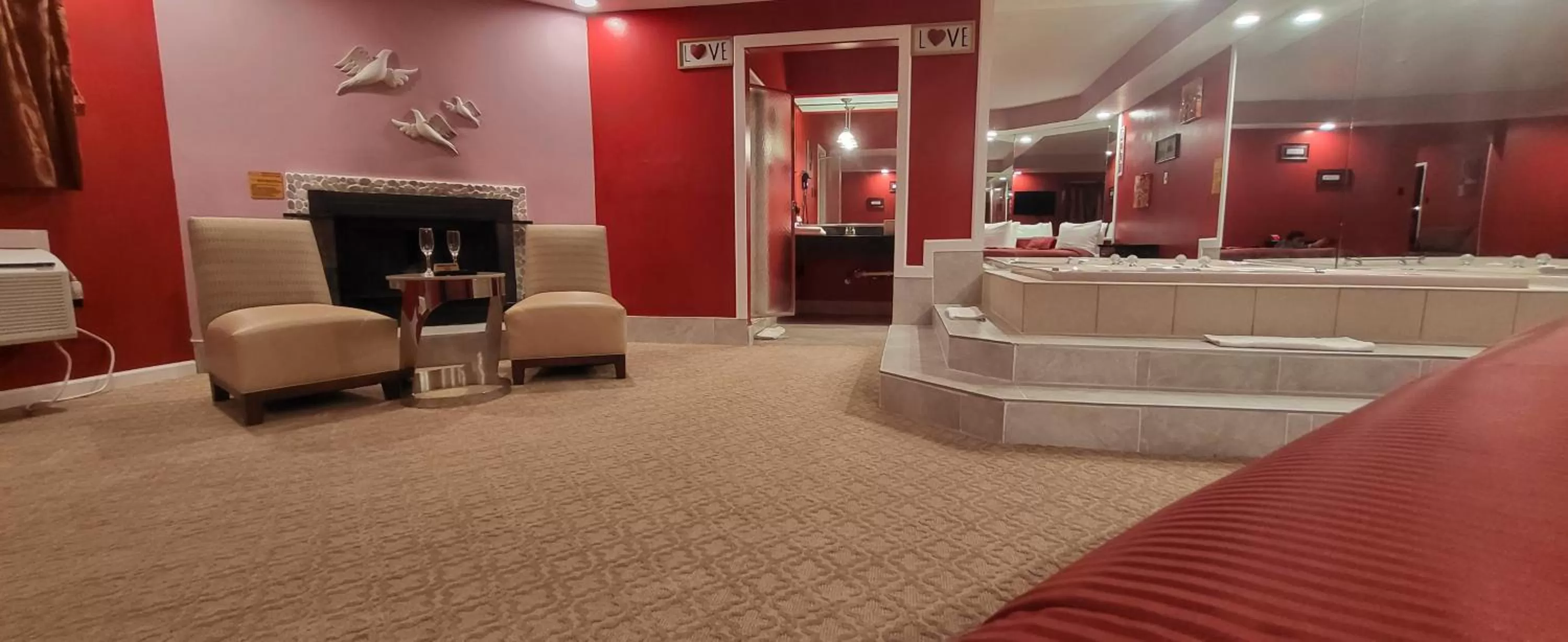 Seating area in Inn of the Dove - Romantic Luxury Suites with Jacuzzi & Seasonal Fireplace at Harrisburg-Hershey-Philadelphia, PA