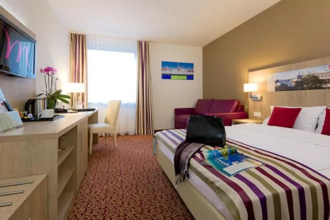 Photo of the whole room, Bed in Mercure Hotel Hamburg am Volkspark