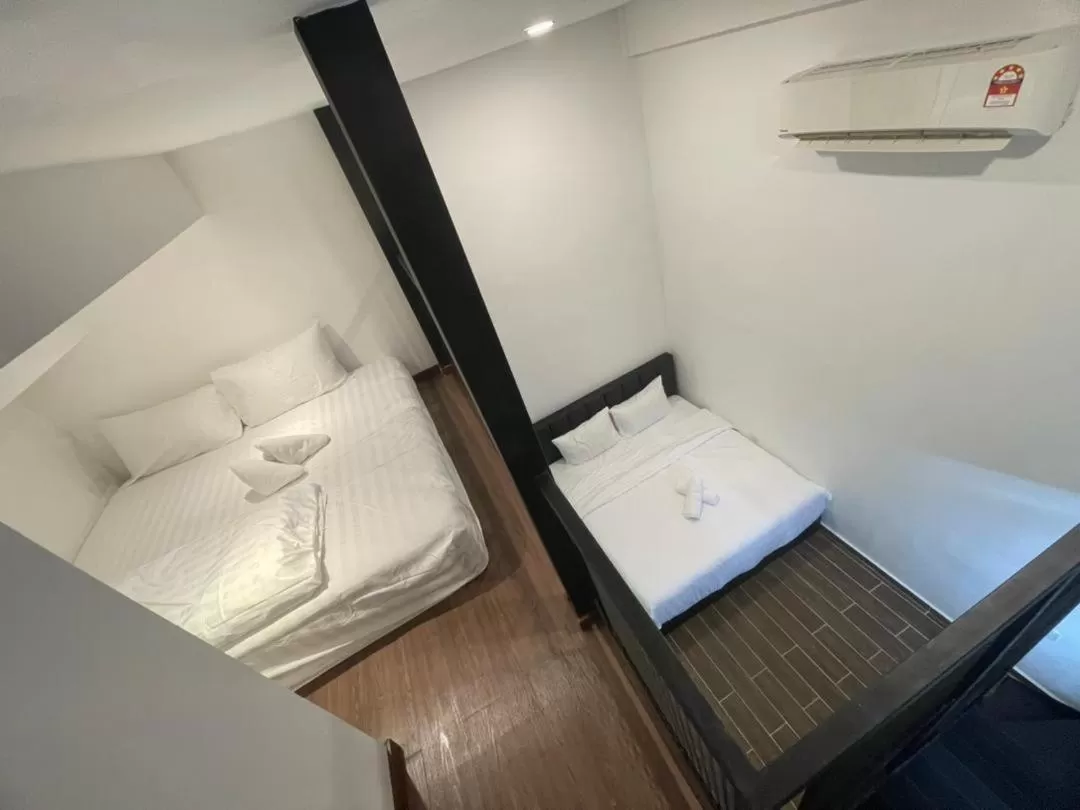 Bed in The Magazine Boutique Hotel