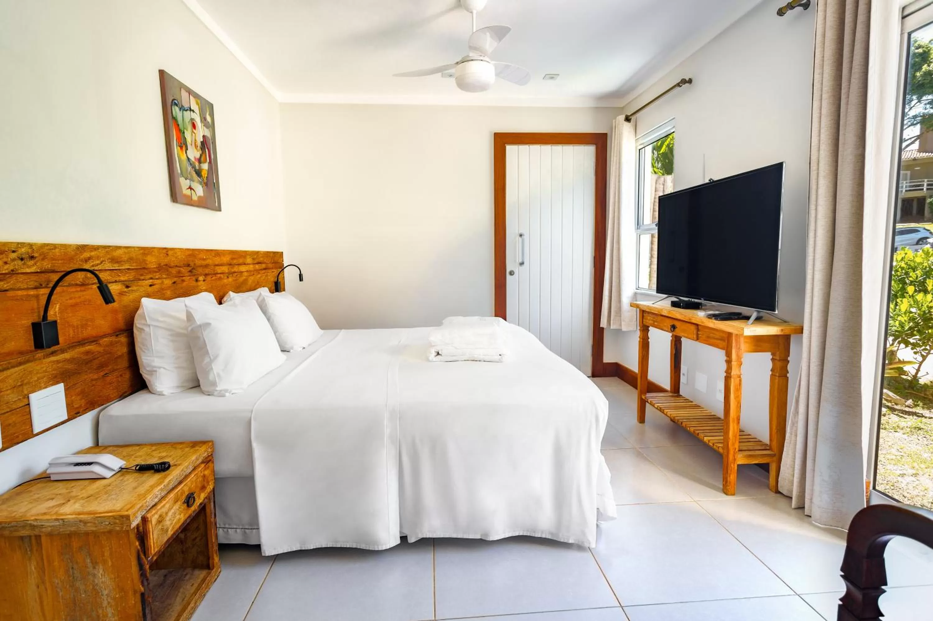 Communal lounge/ TV room, Bed in Apa Pau Brasil