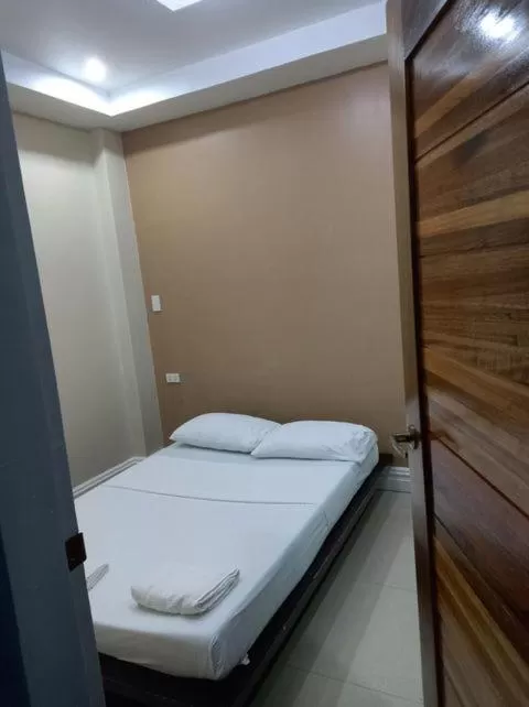 Bed in Sandscape Hotel
