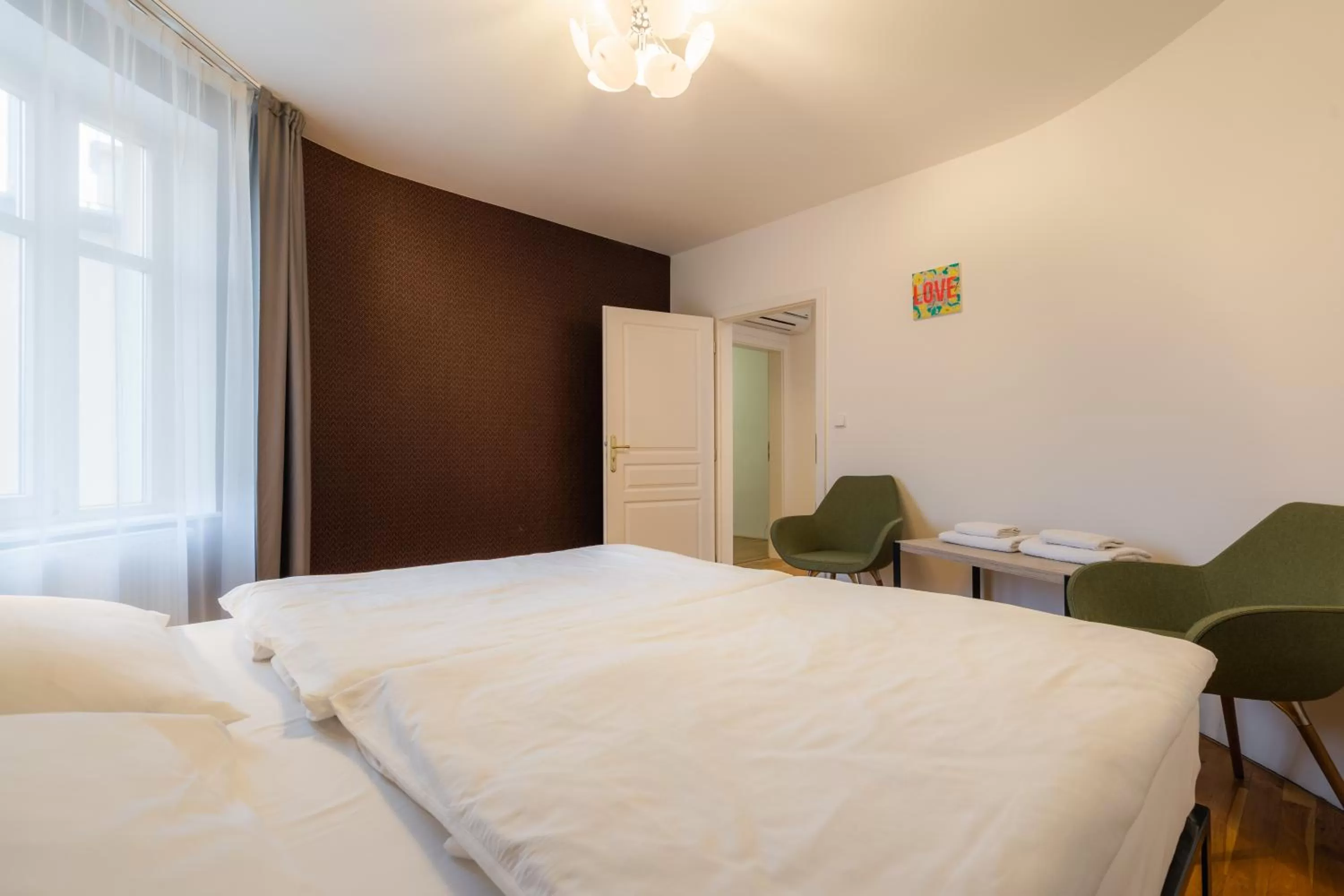 Bed in EA ApartHotel Melantrich