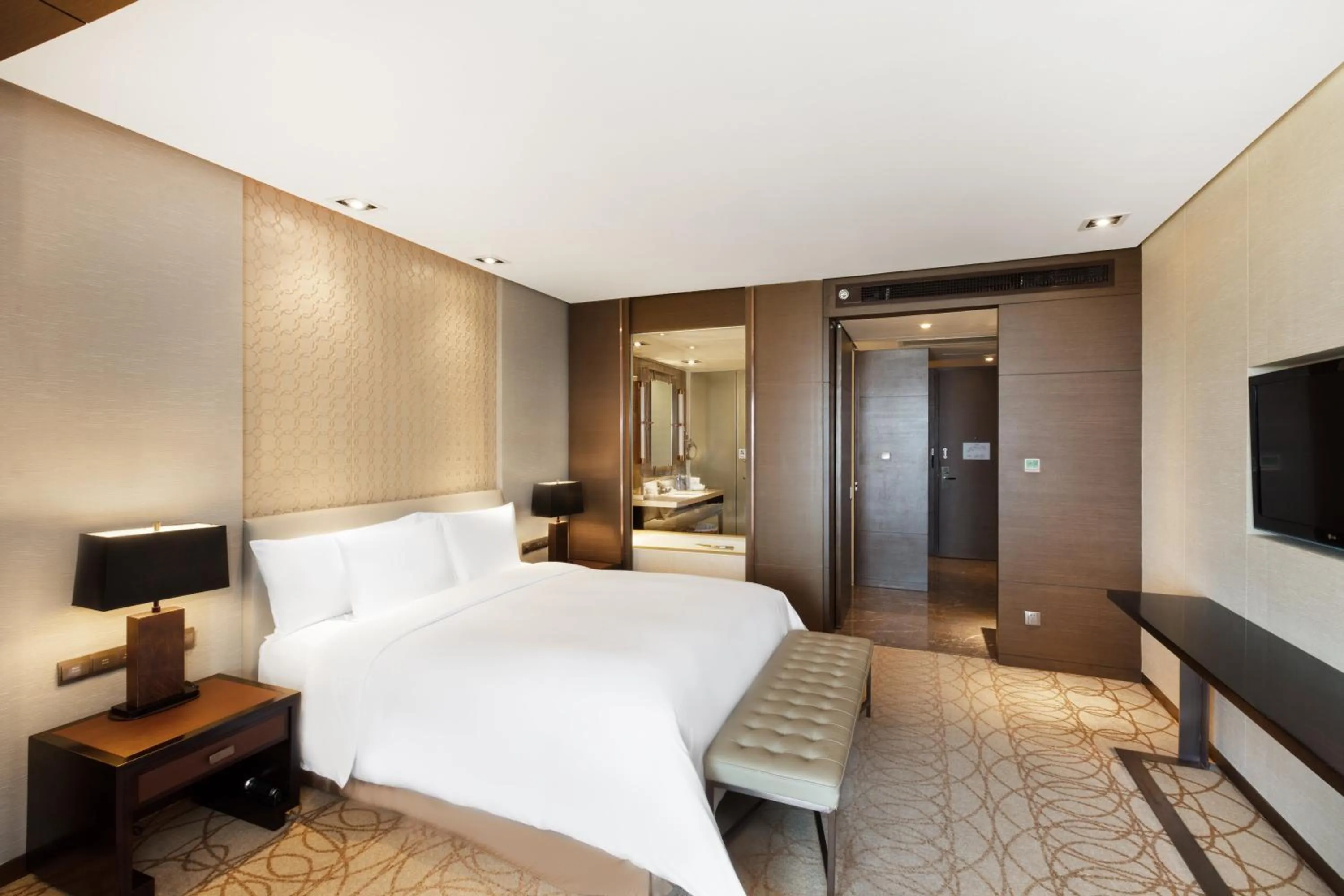 Photo of the whole room, Bed in Crowne Plaza Xuzhou Dalong Lake by IHG