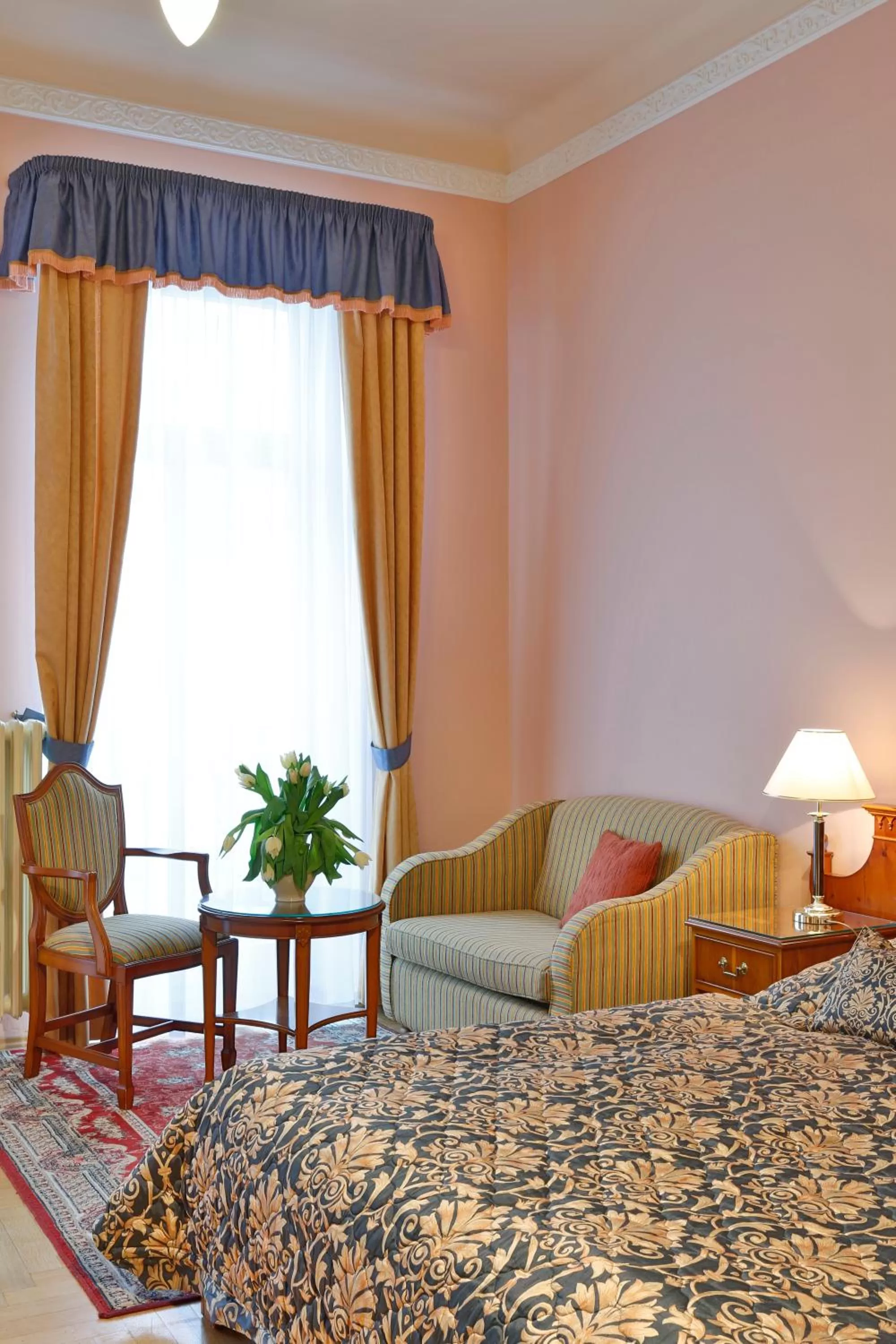 Seating area, Bed in Hotel Kolonada