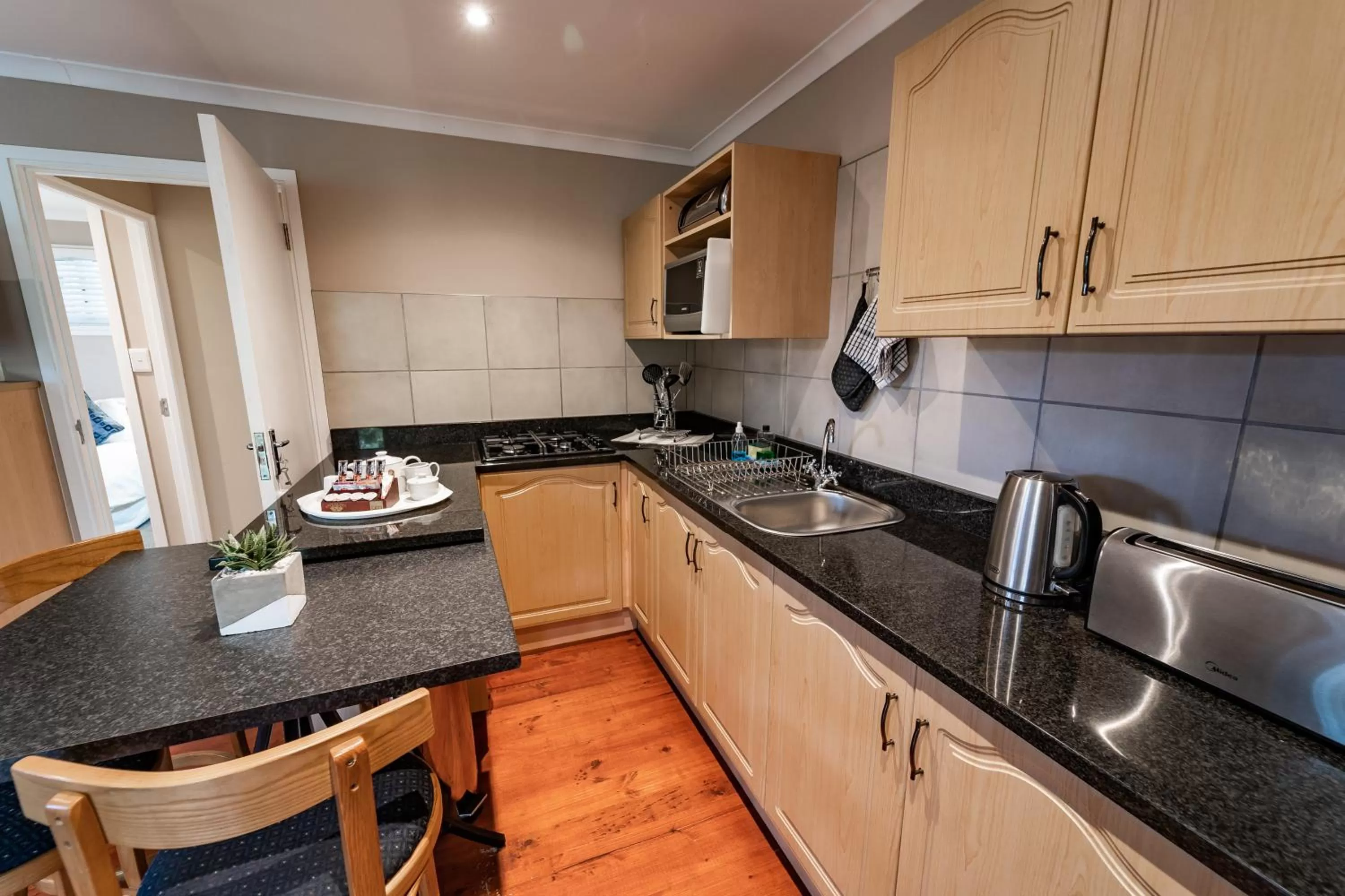 Kitchen or kitchenette in Gooderson Knysna Chalets
