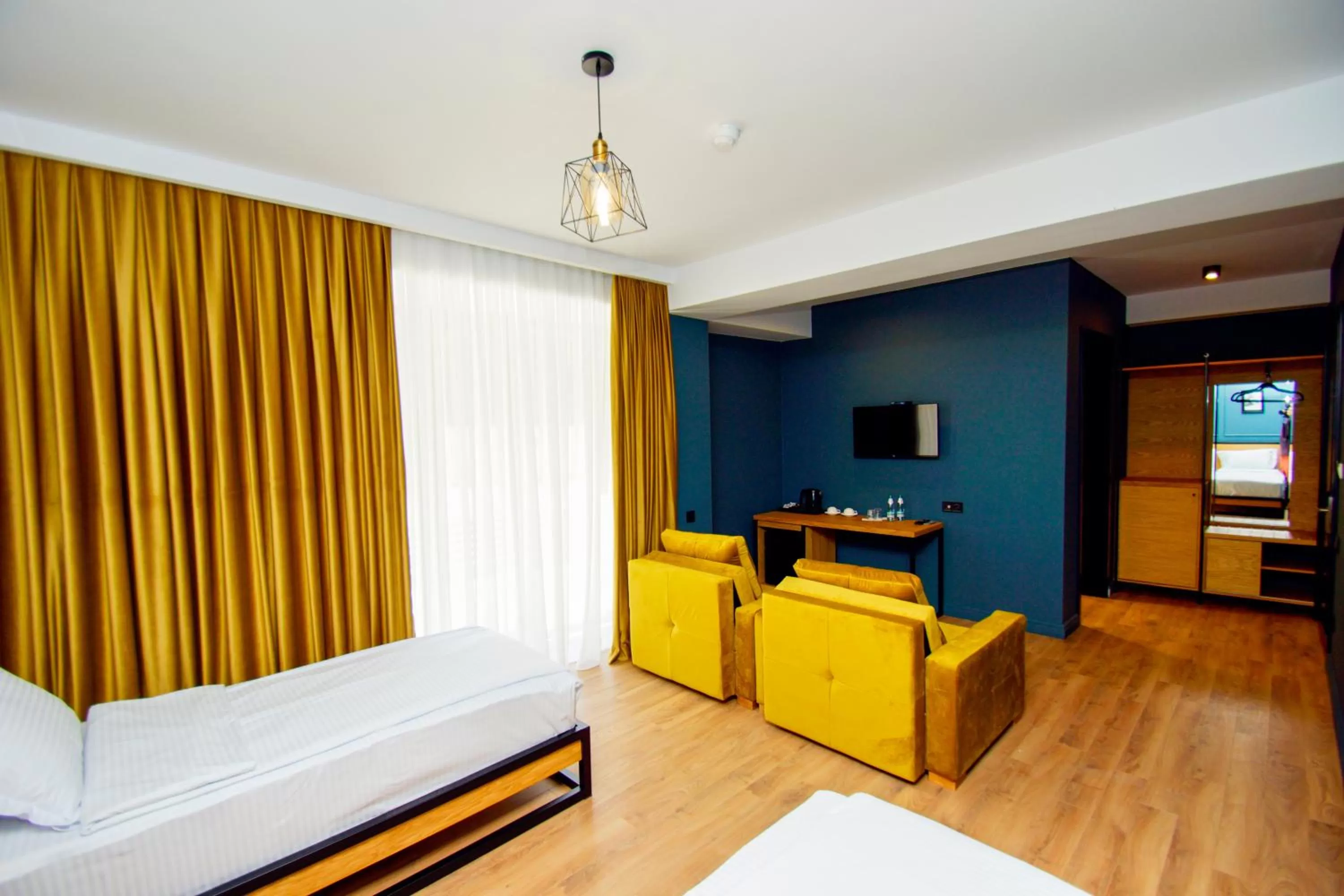 Living room, Bed in Borjomi Bridge Hotel