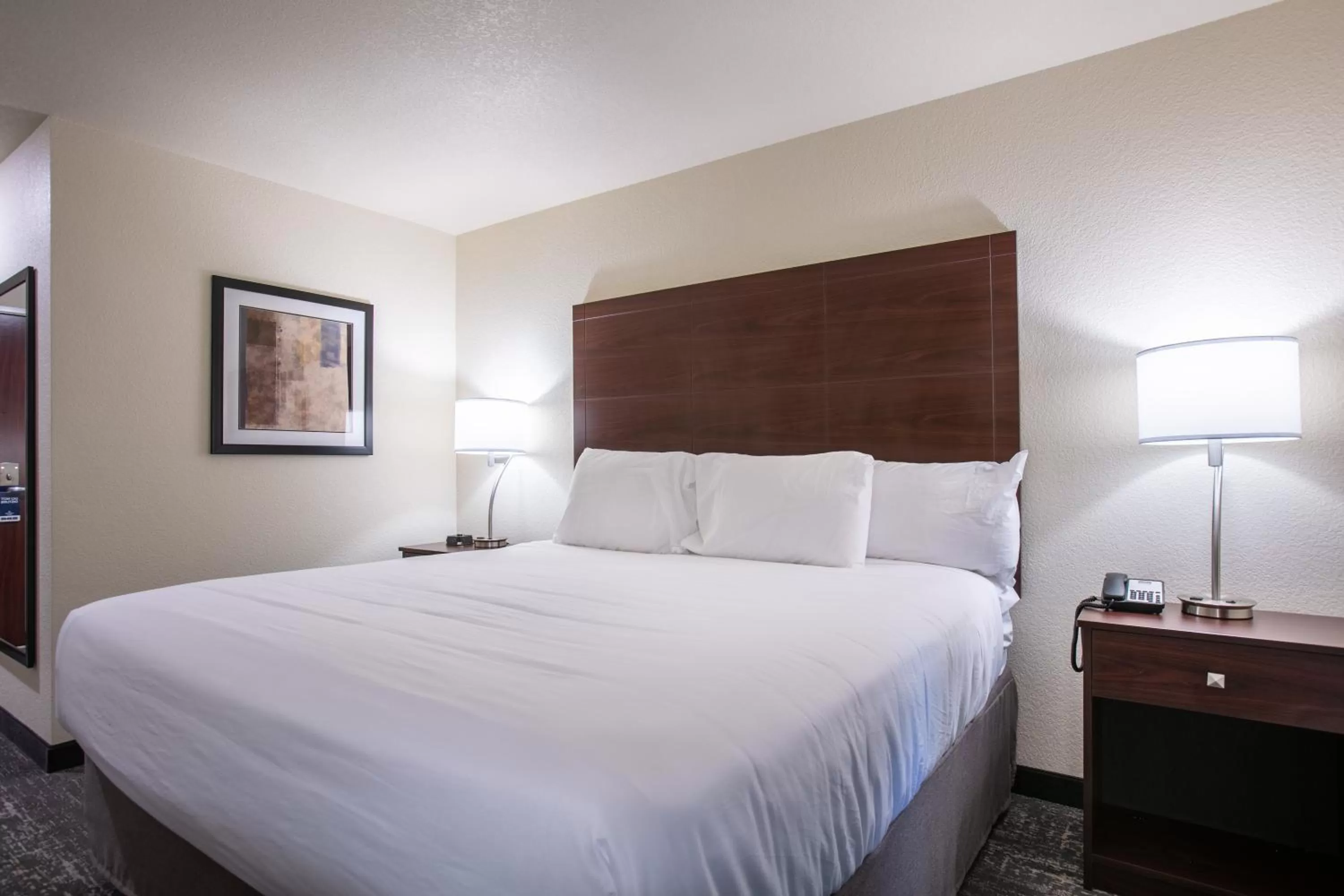 Bed in Cobblestone Inn & Suites - Pine Bluffs