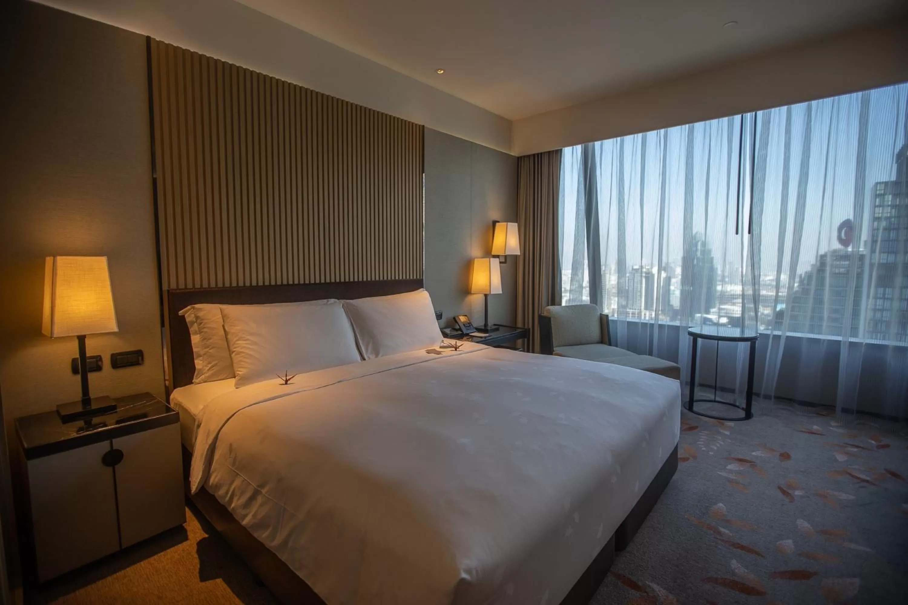 Bed in The Okura Prestige Bangkok